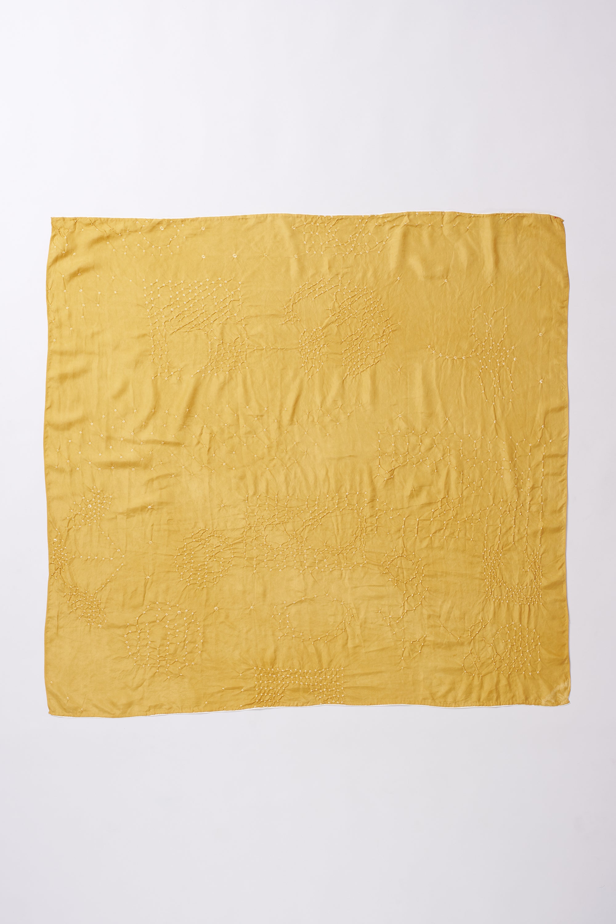 Yellow textured fabric square