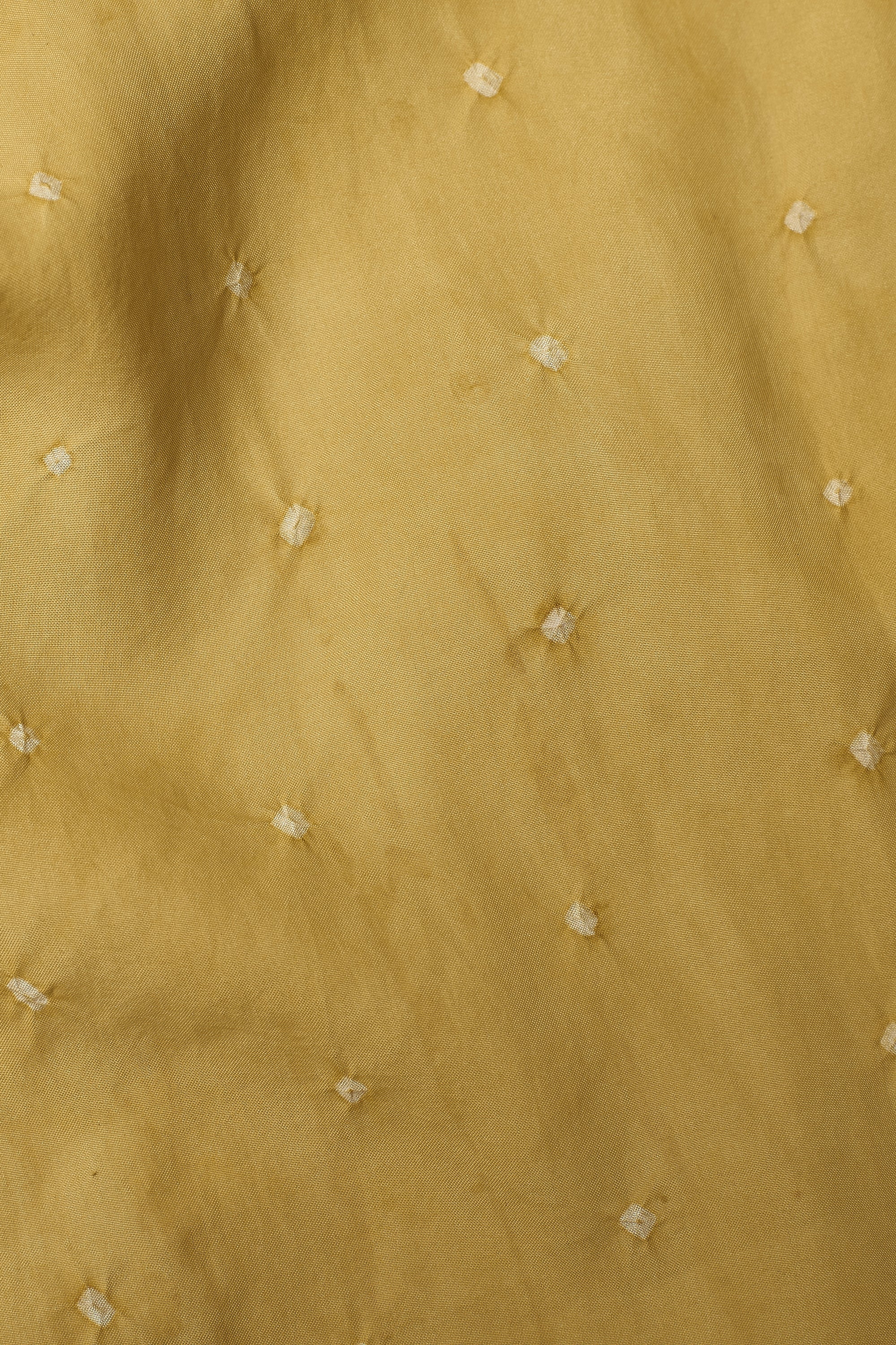 Close-up of a textured beige fabric