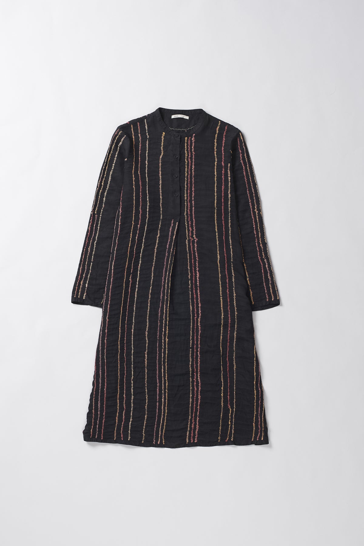 Black dress with thin red stripes on a white background