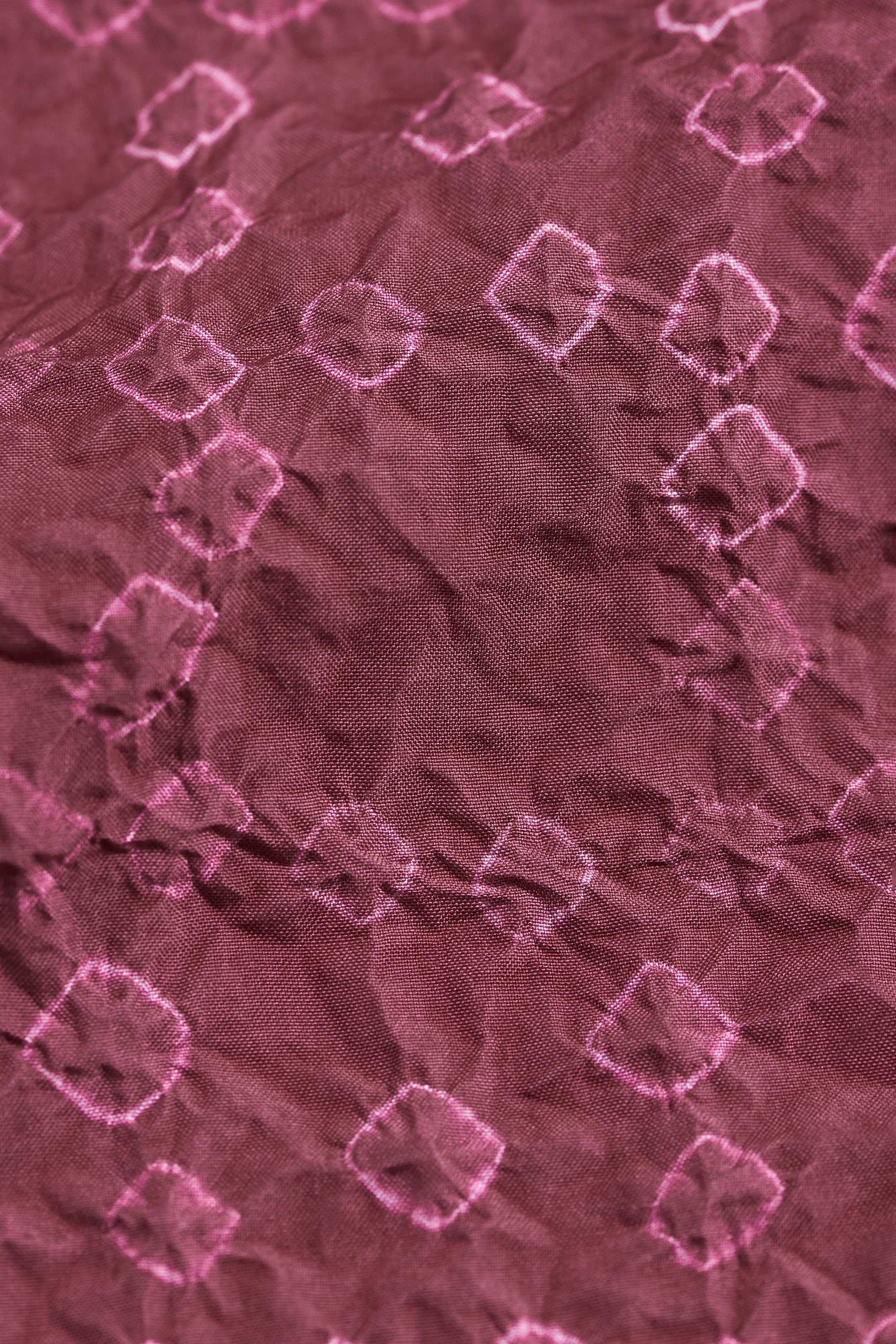 Close-up of a textured purple fabric