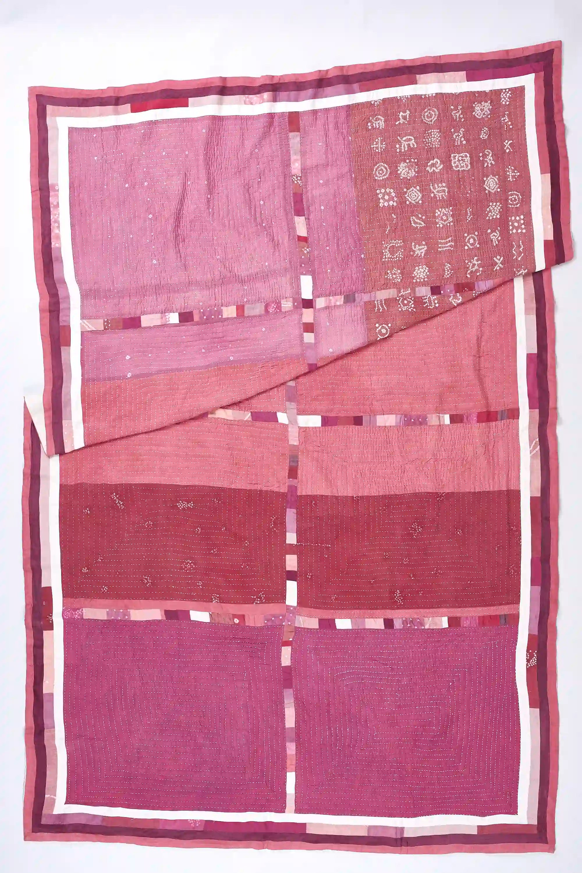 Patchwork quilt in shades of pink