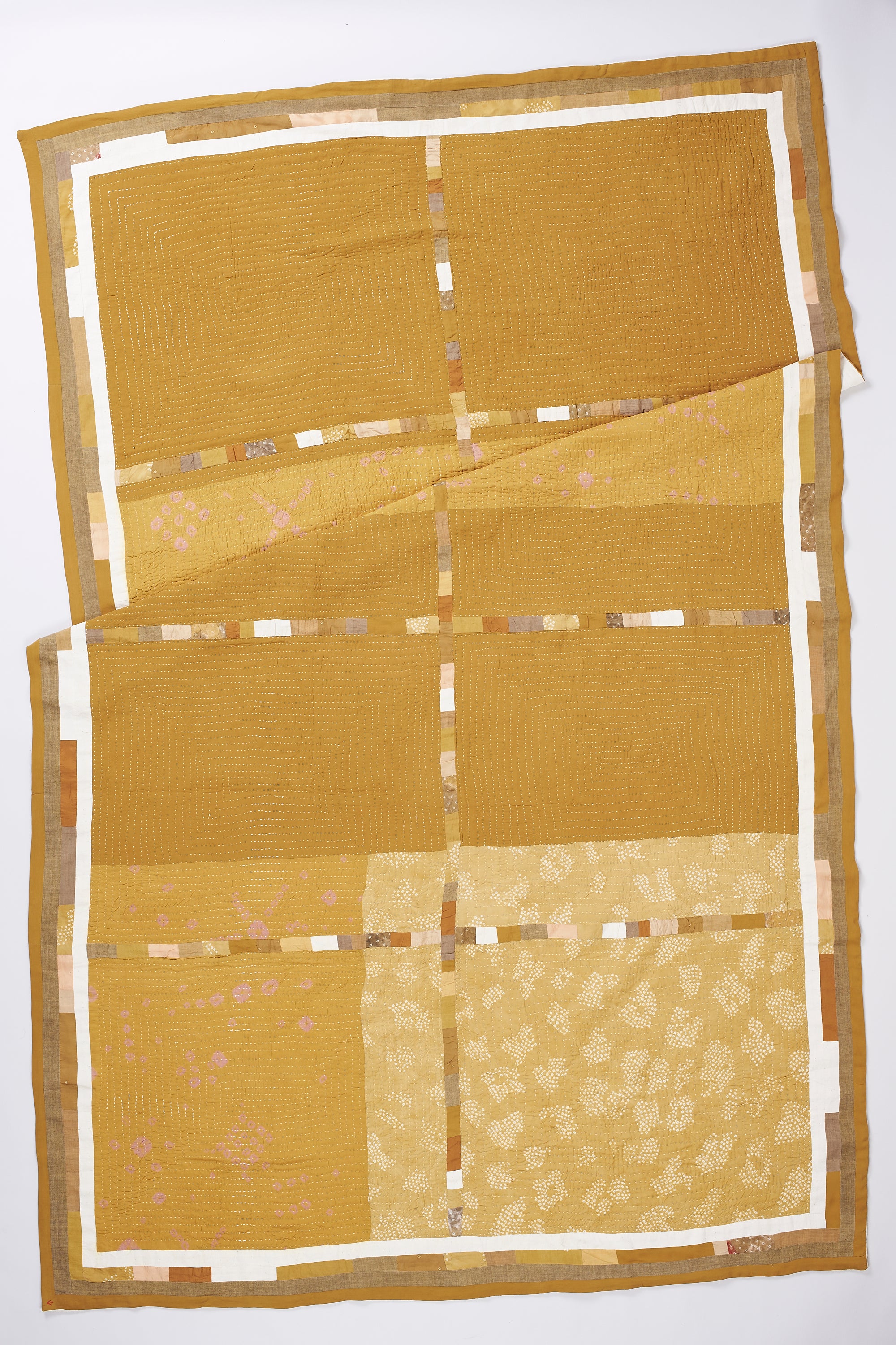 Hand Embroidered Patchwork Quilt in Ocher Yellow