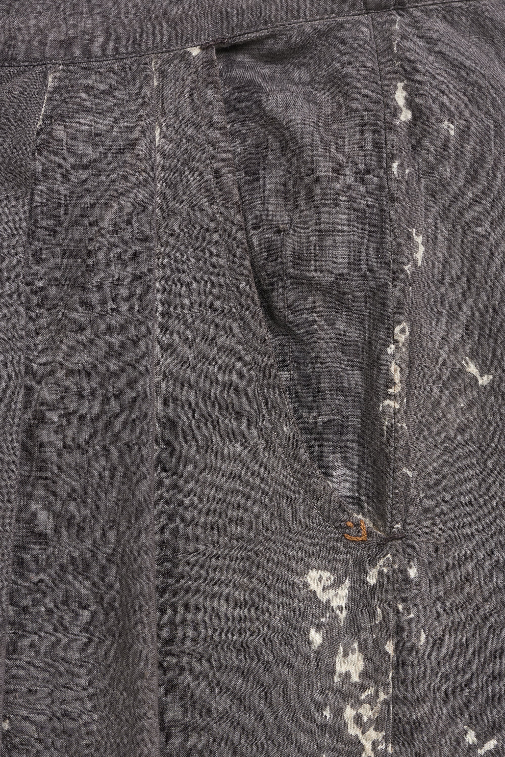 Close-up of dark gray pants