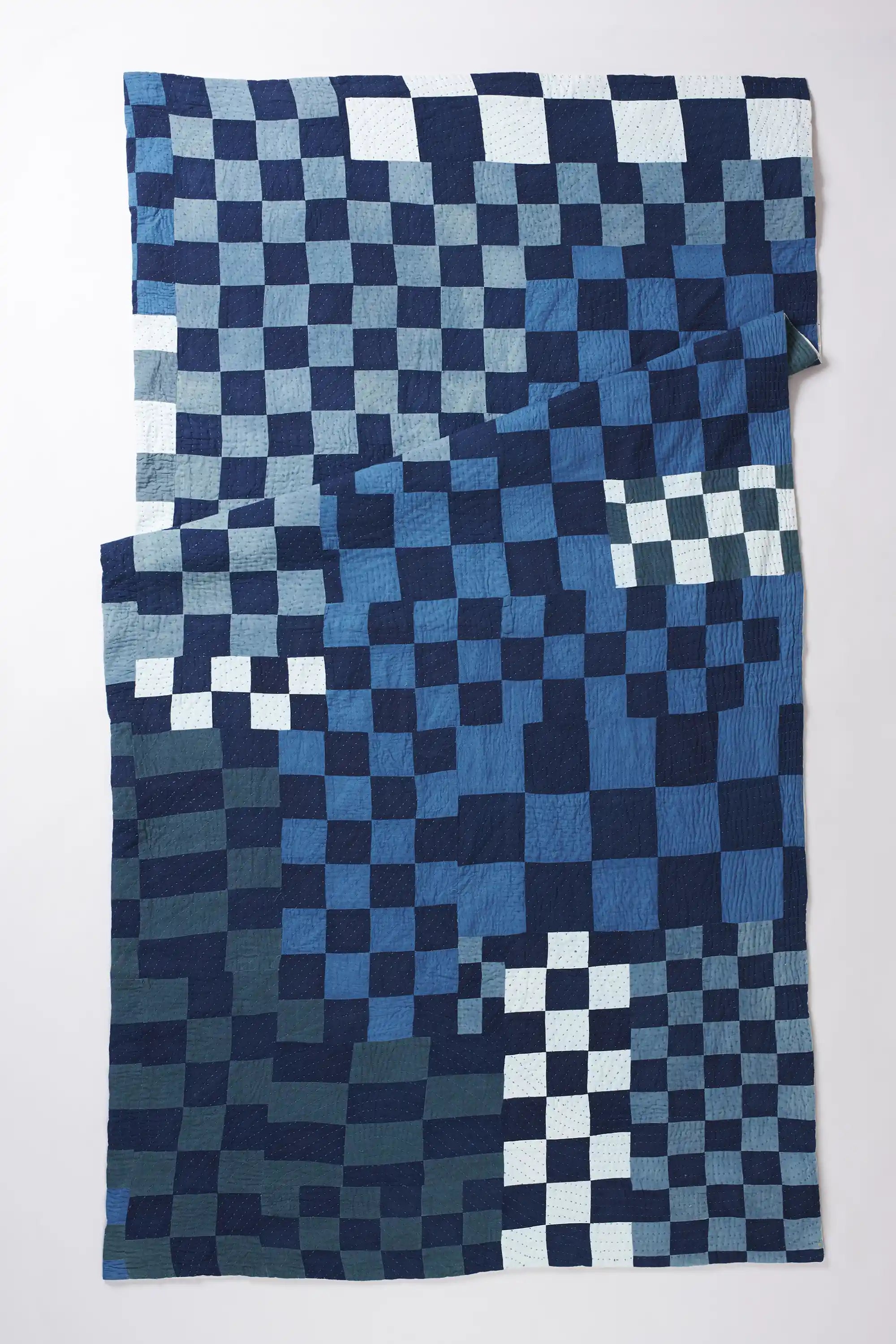 Patchwork quilt in shades of indigo