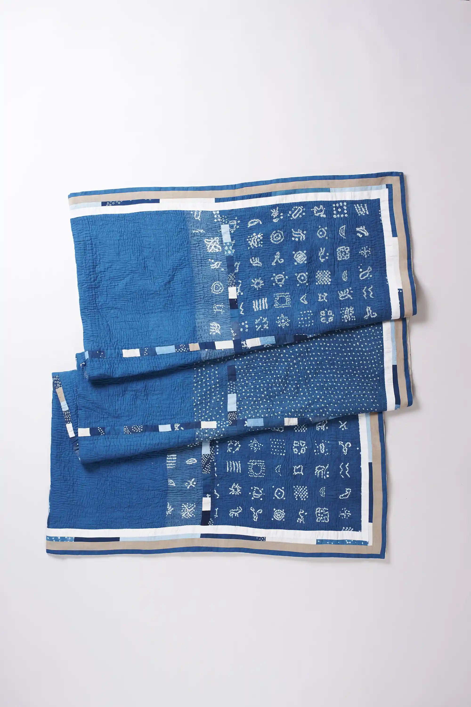 Blue patterned fabric on a white background