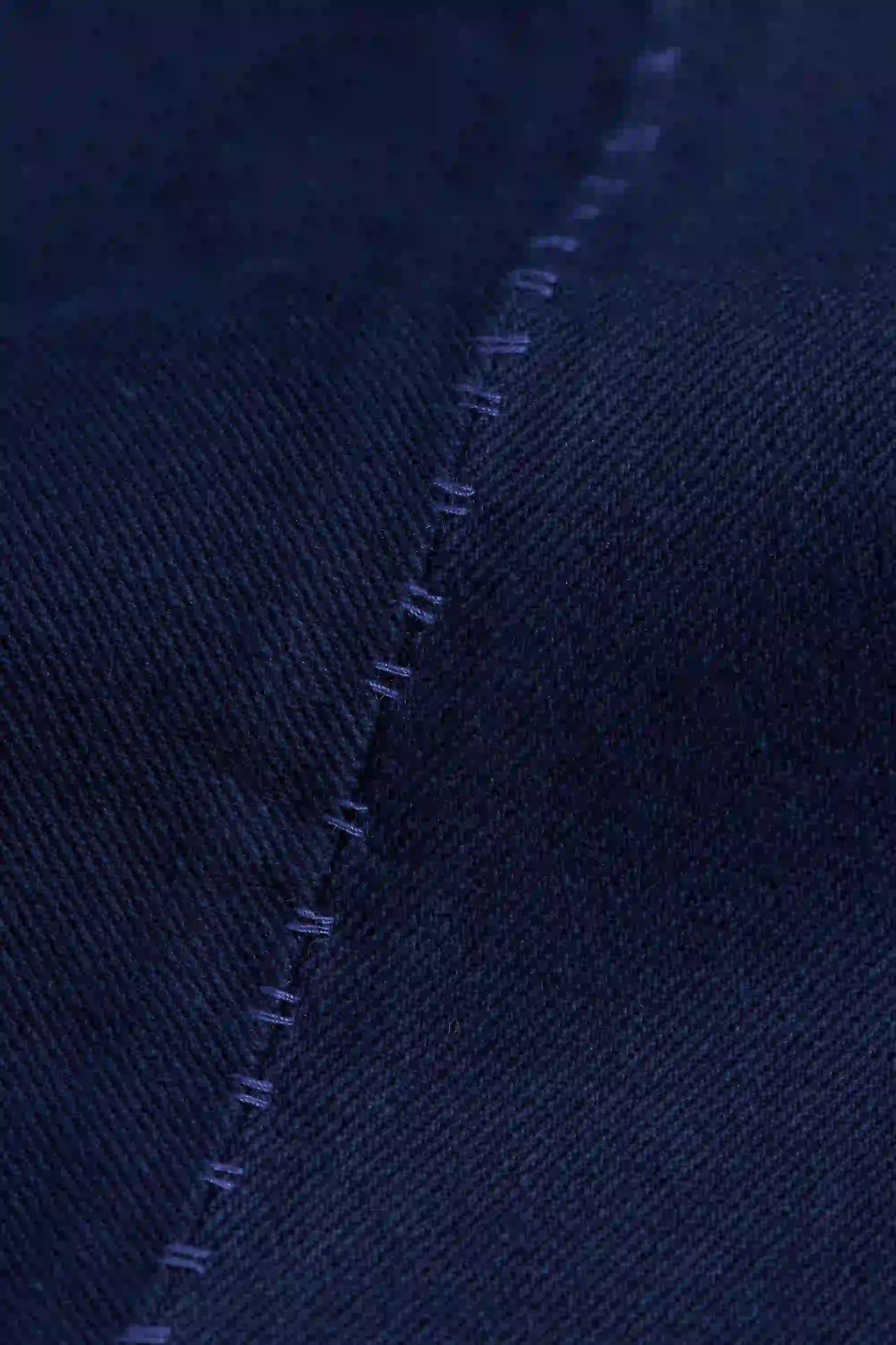 Fabric close-up with hand detailing