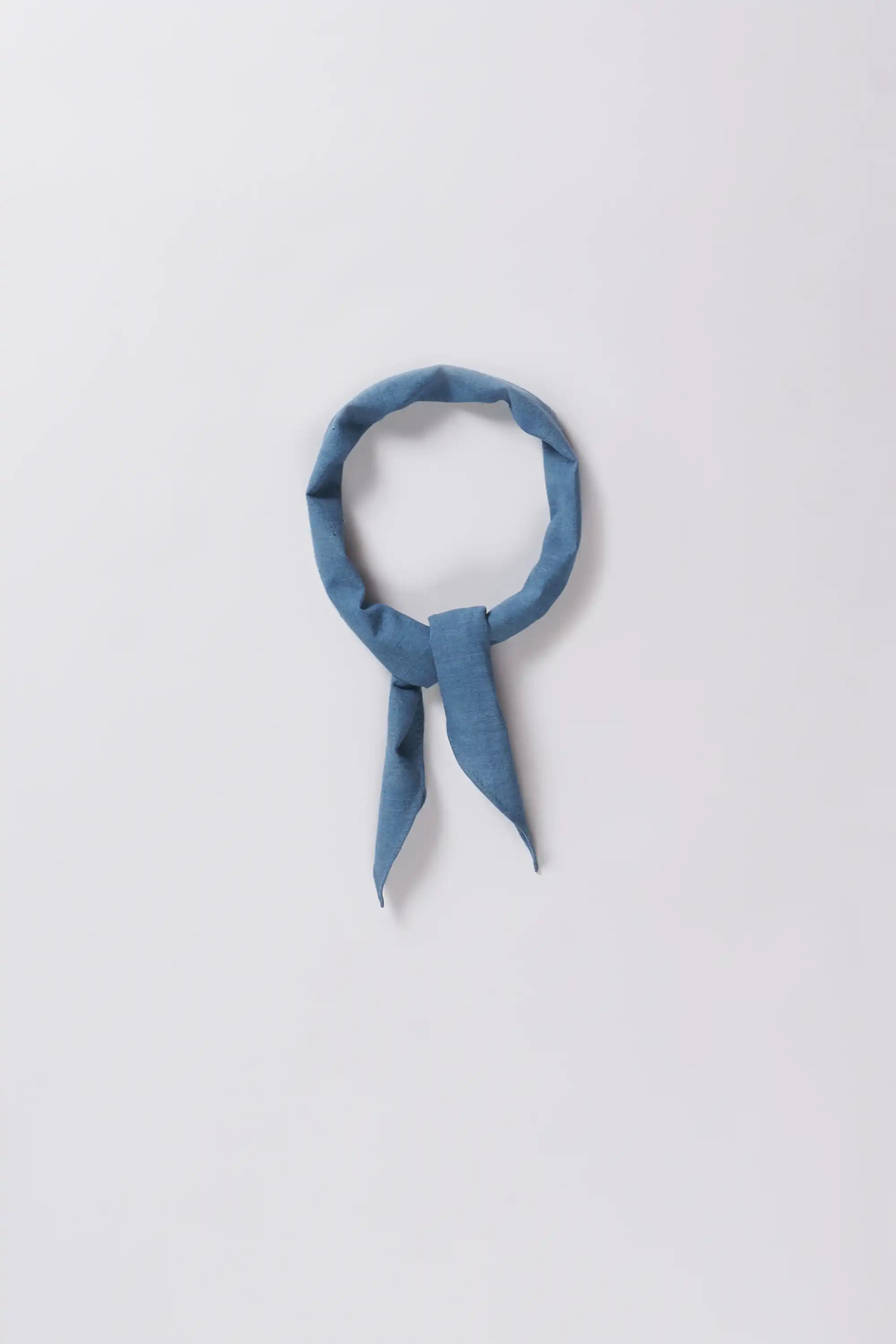 Powder blue bandana on a light grey background