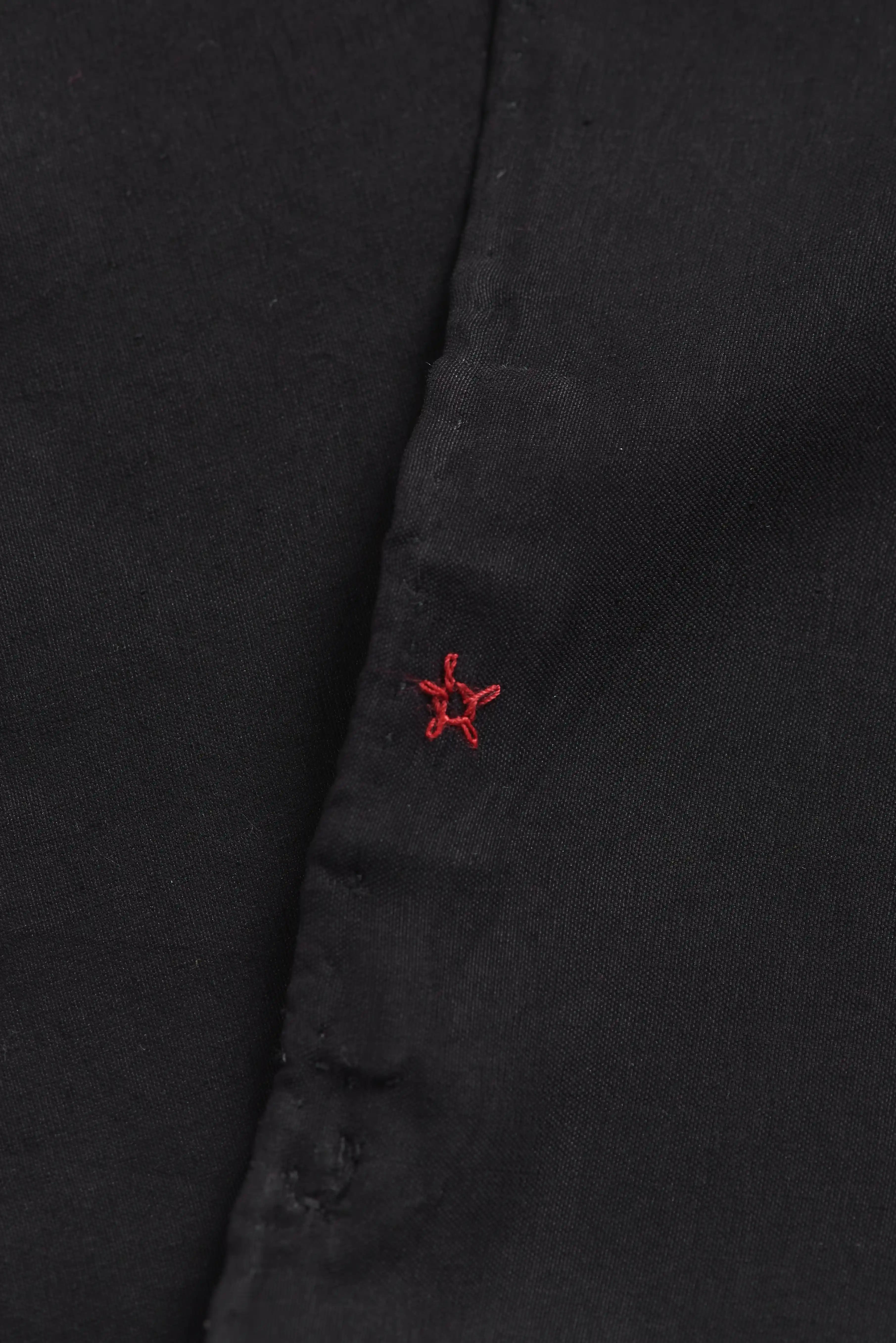 Fabric close-up with red small pehchan