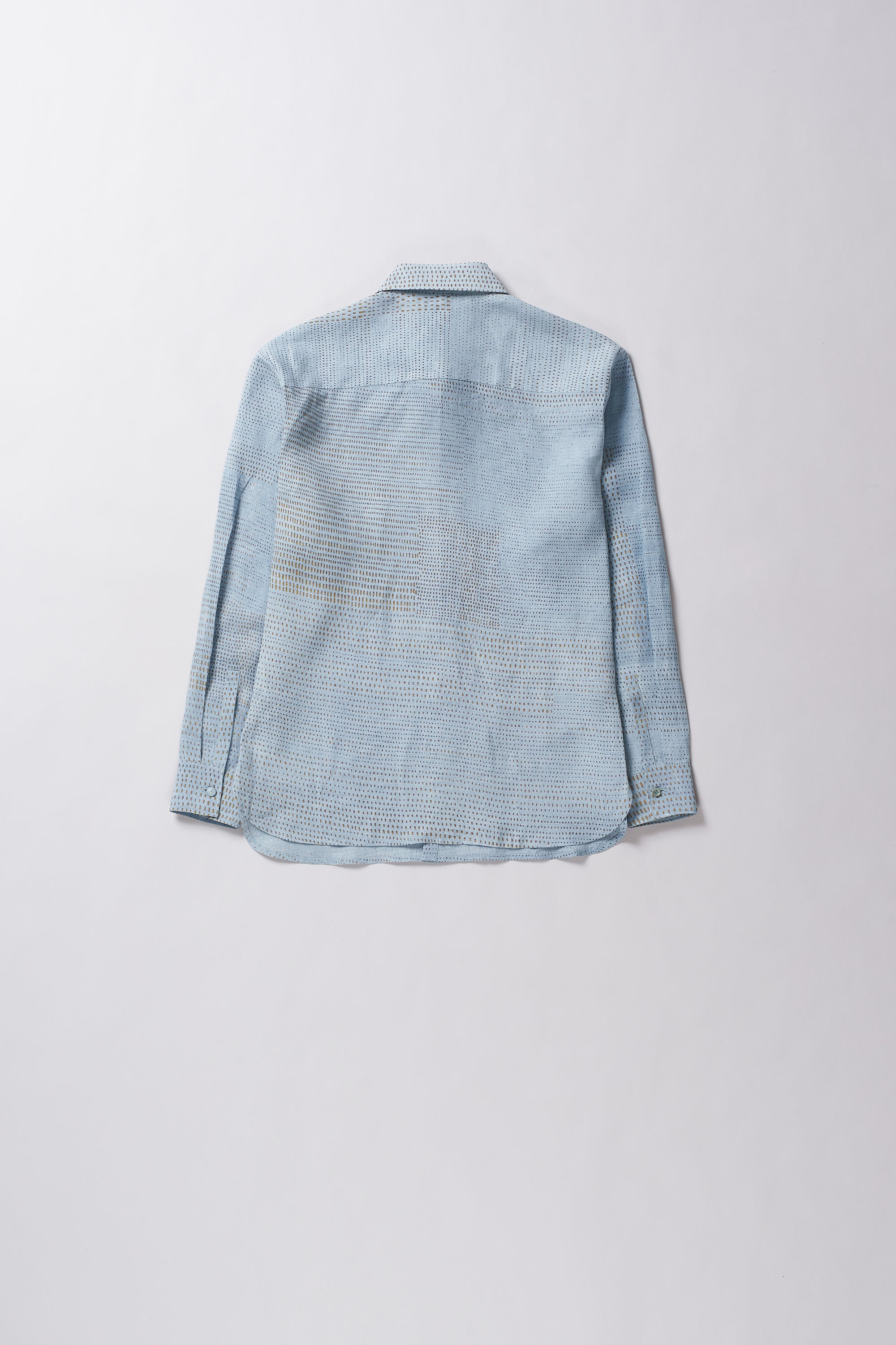Light blue denim jacket on a white background