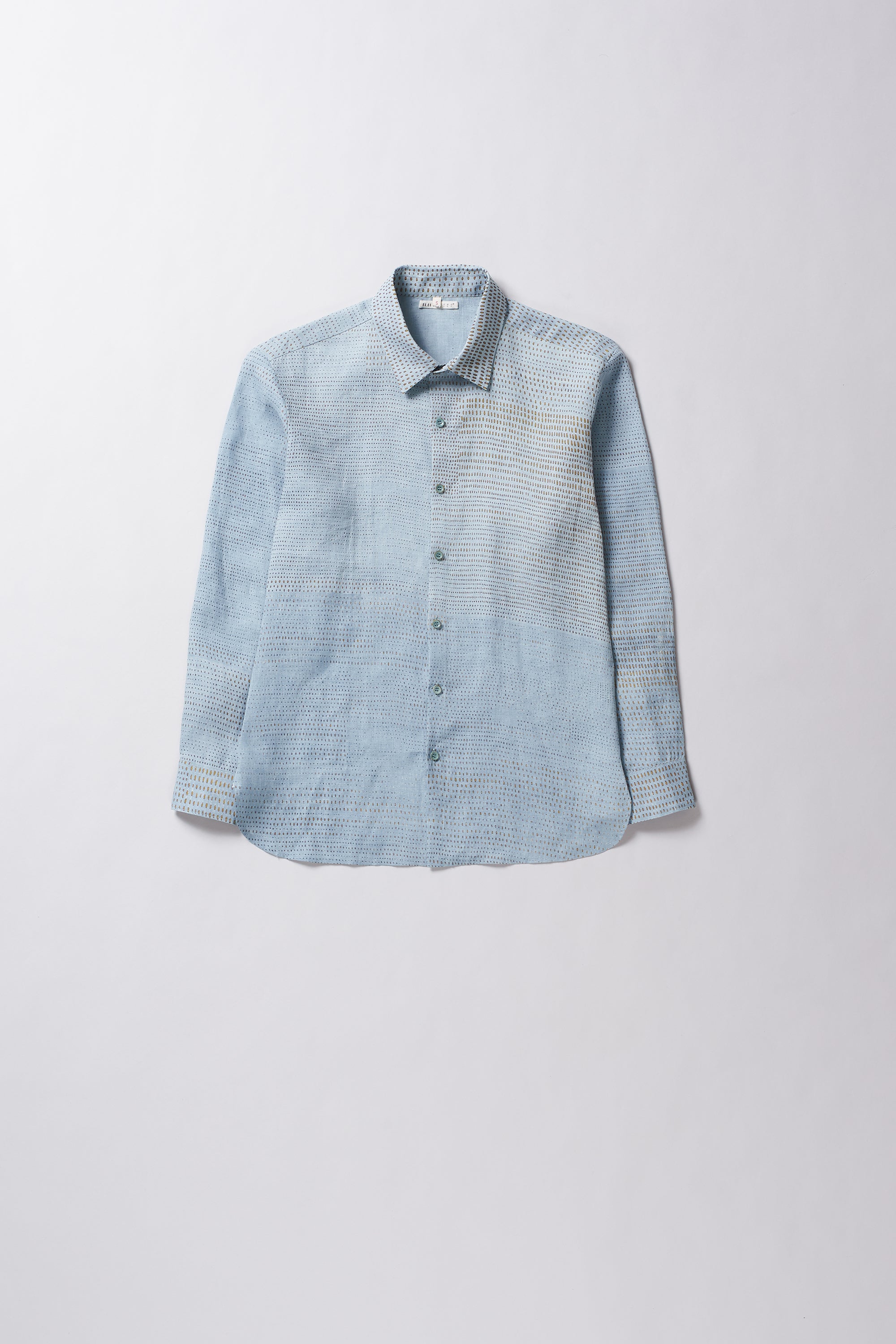 Light blue checkered shirt on a white background