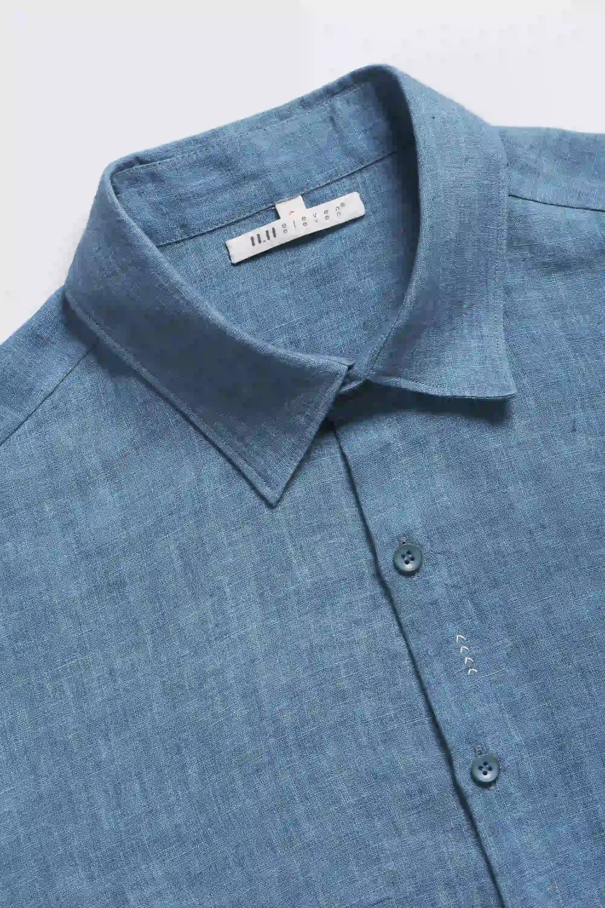 Fabric close-up with buttons and collar