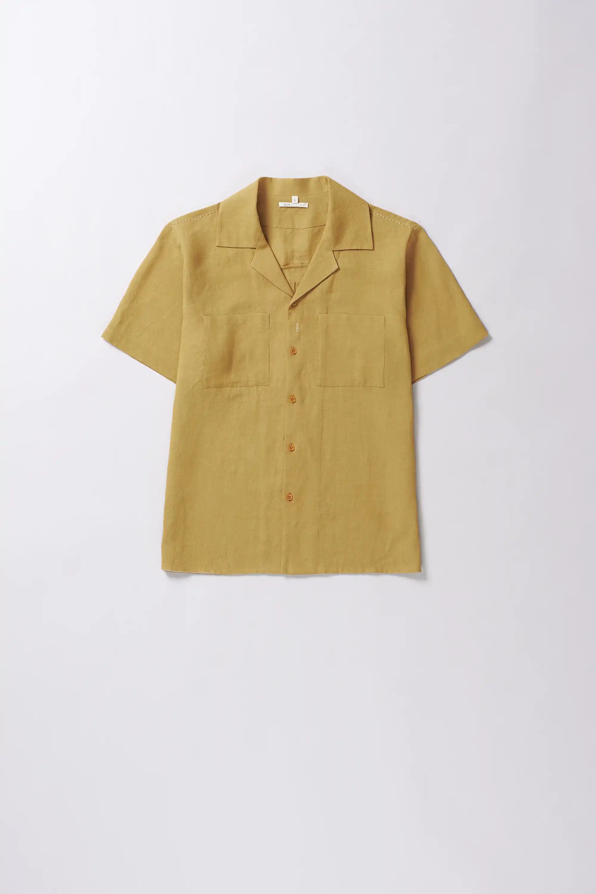 Front image of a linen ochre yellow shirt
