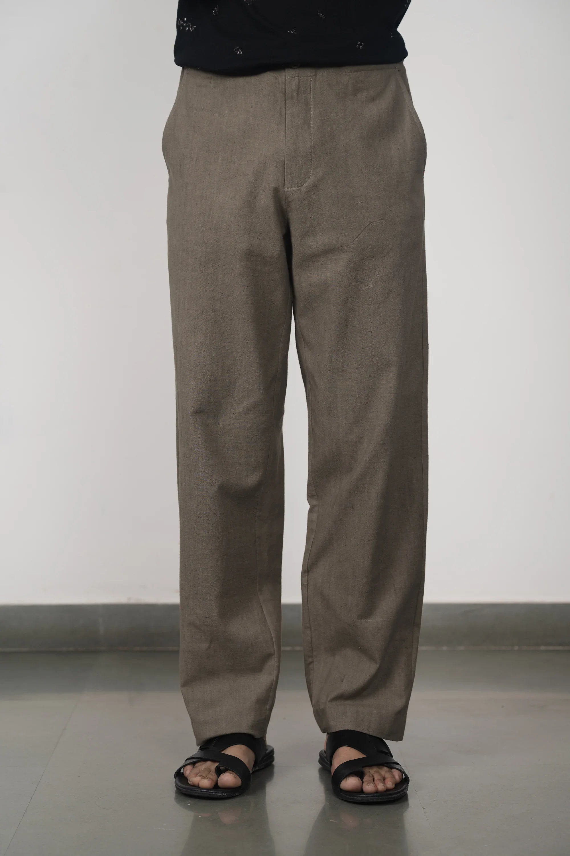 A man wearing ashy grey pant