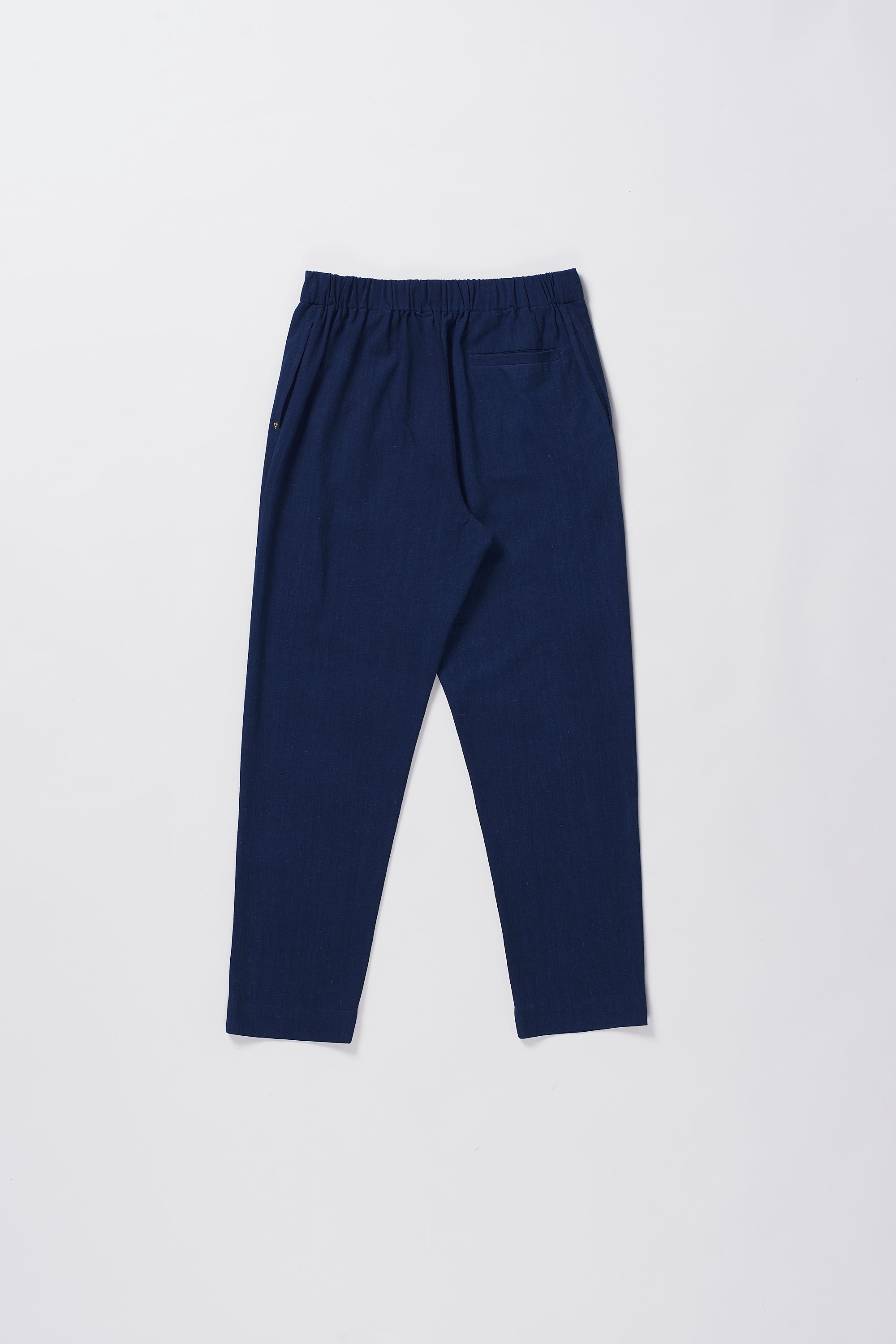 TAPERED FIT TROUSERS IN INDIGO