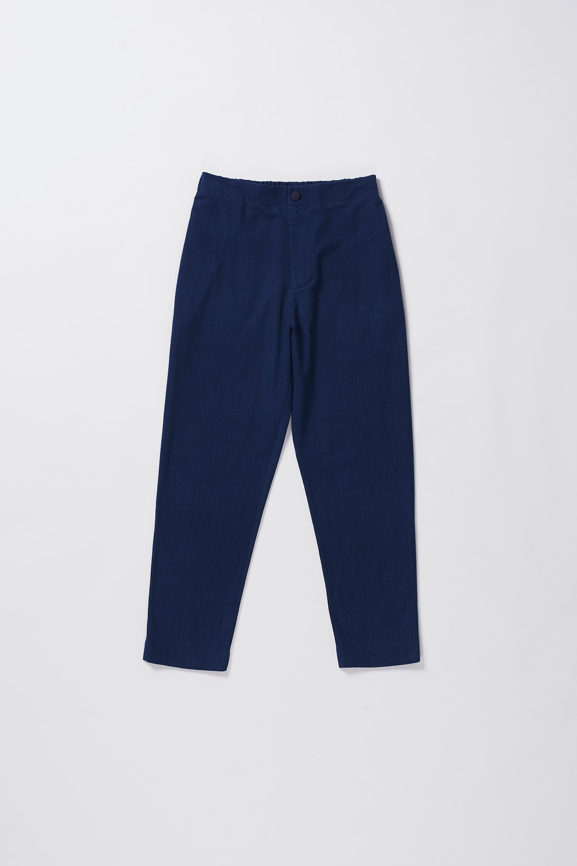 TAPERED FIT TROUSERS IN INDIGO