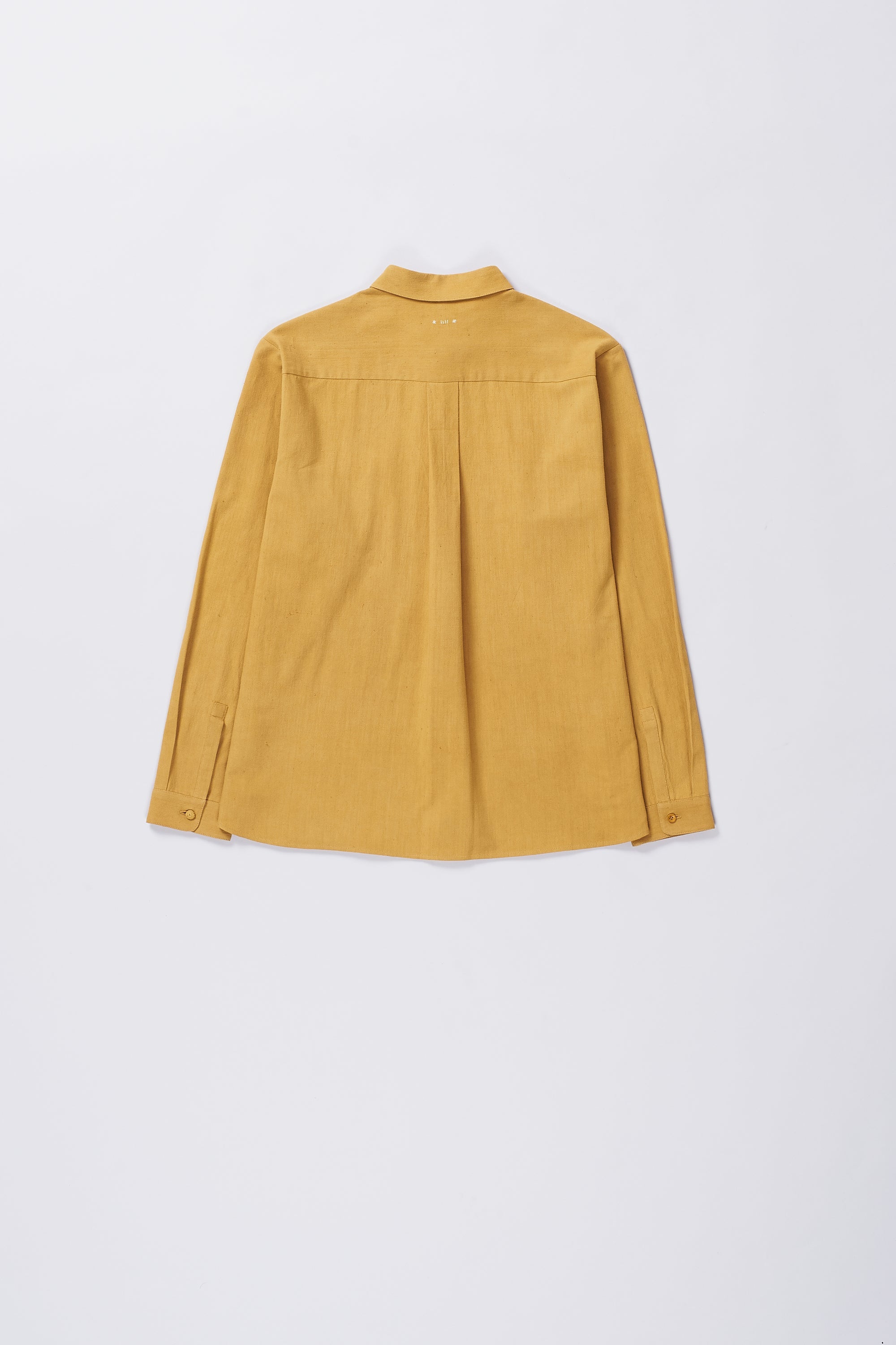 Back image of a mustard yellow shirt