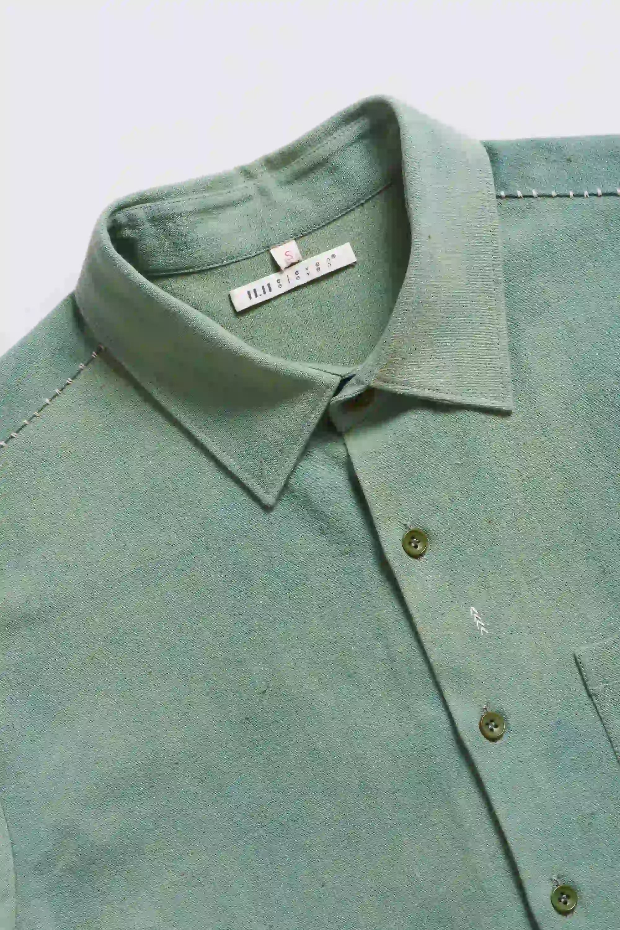 Fabric close-up with buttons and collar