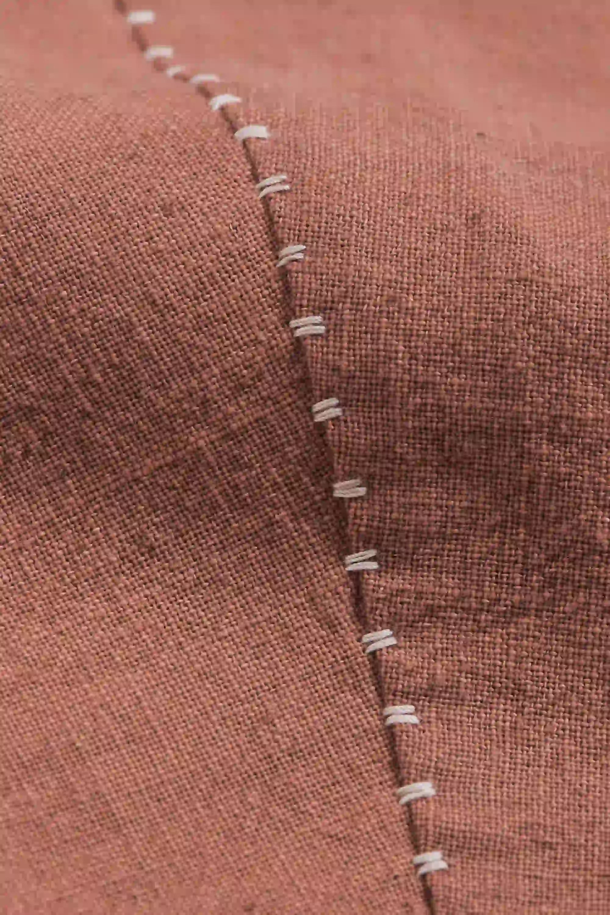 Fabric close-up with hand detailing