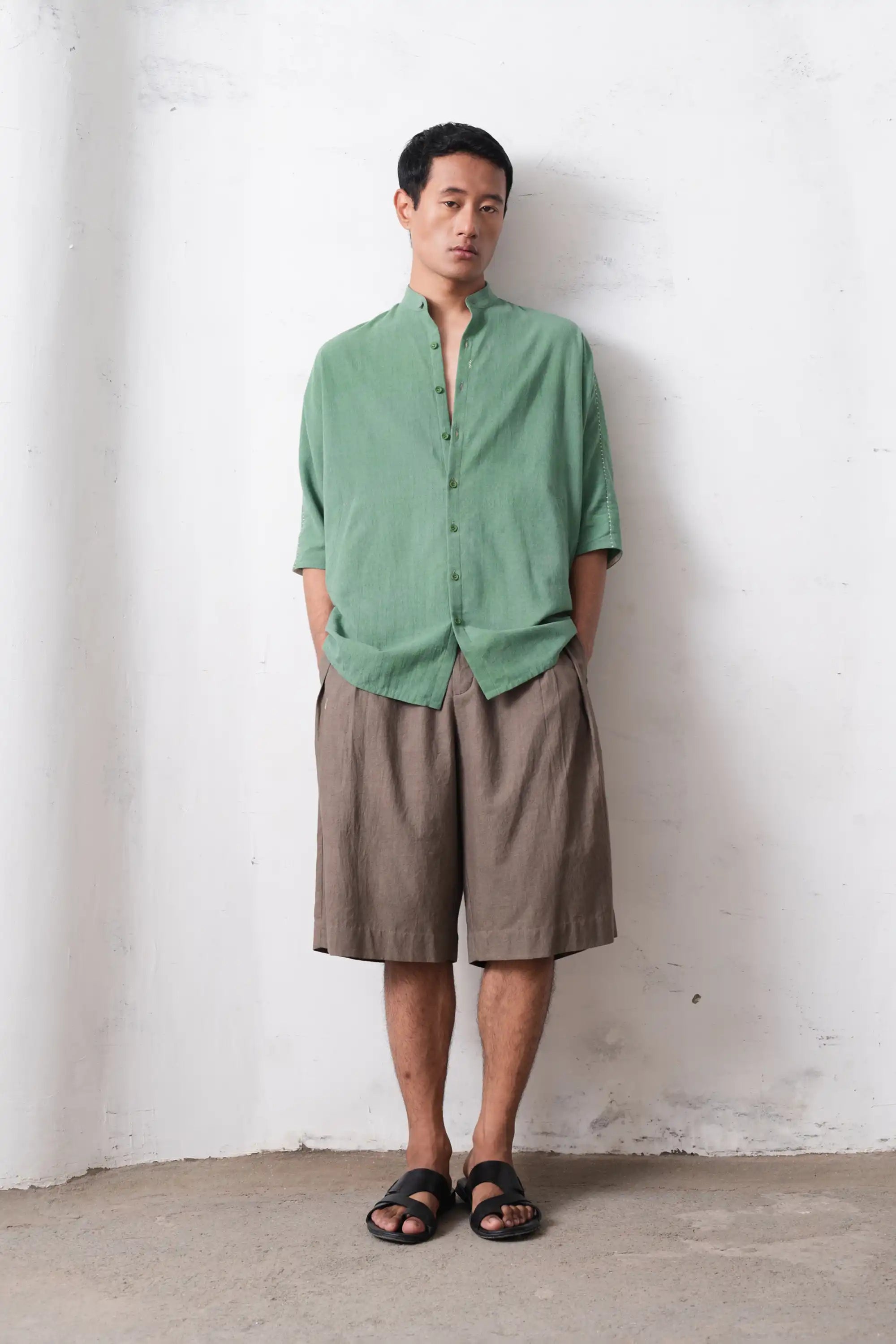 A man wearing macca shirt