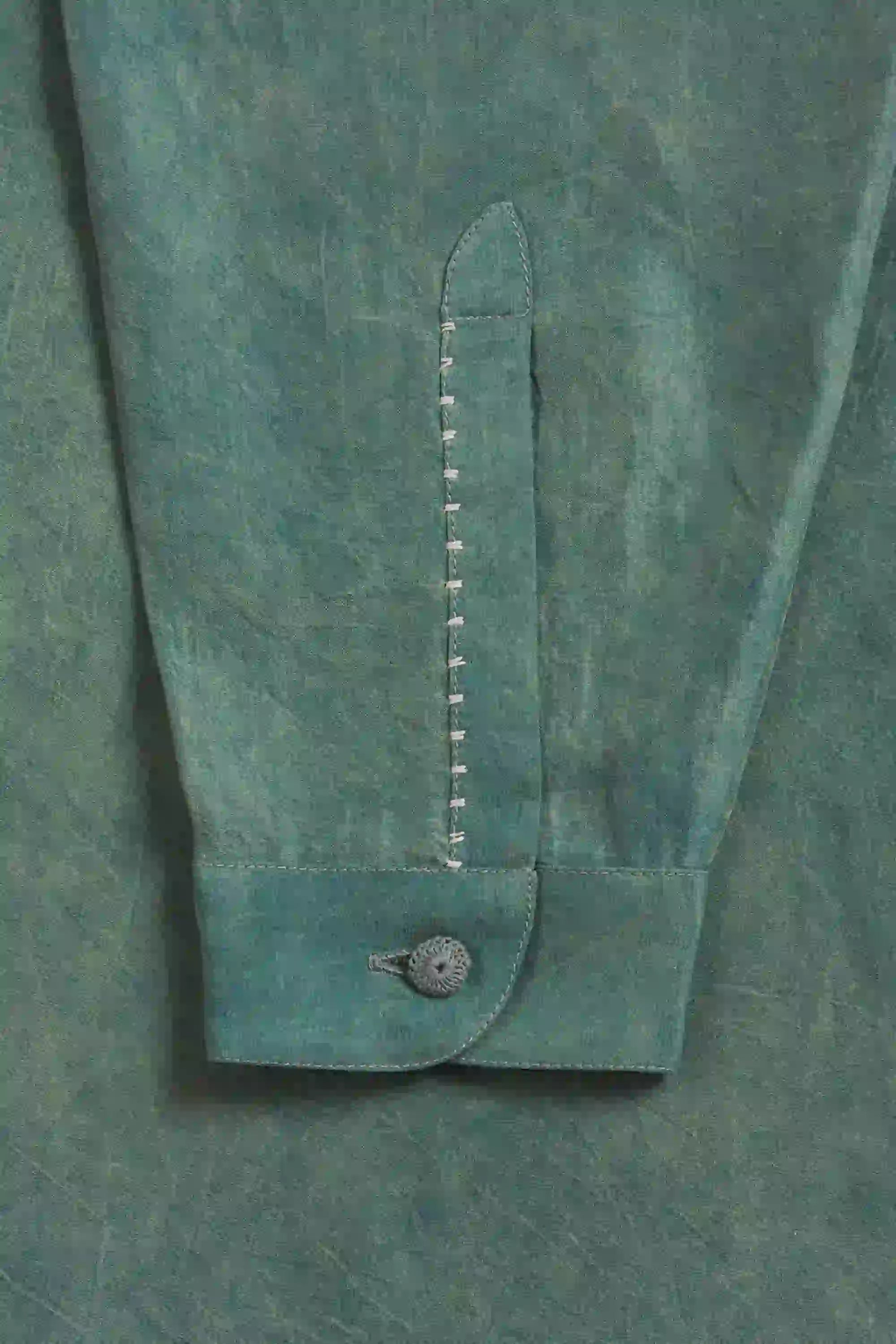 Fabric close-up with hand detailing