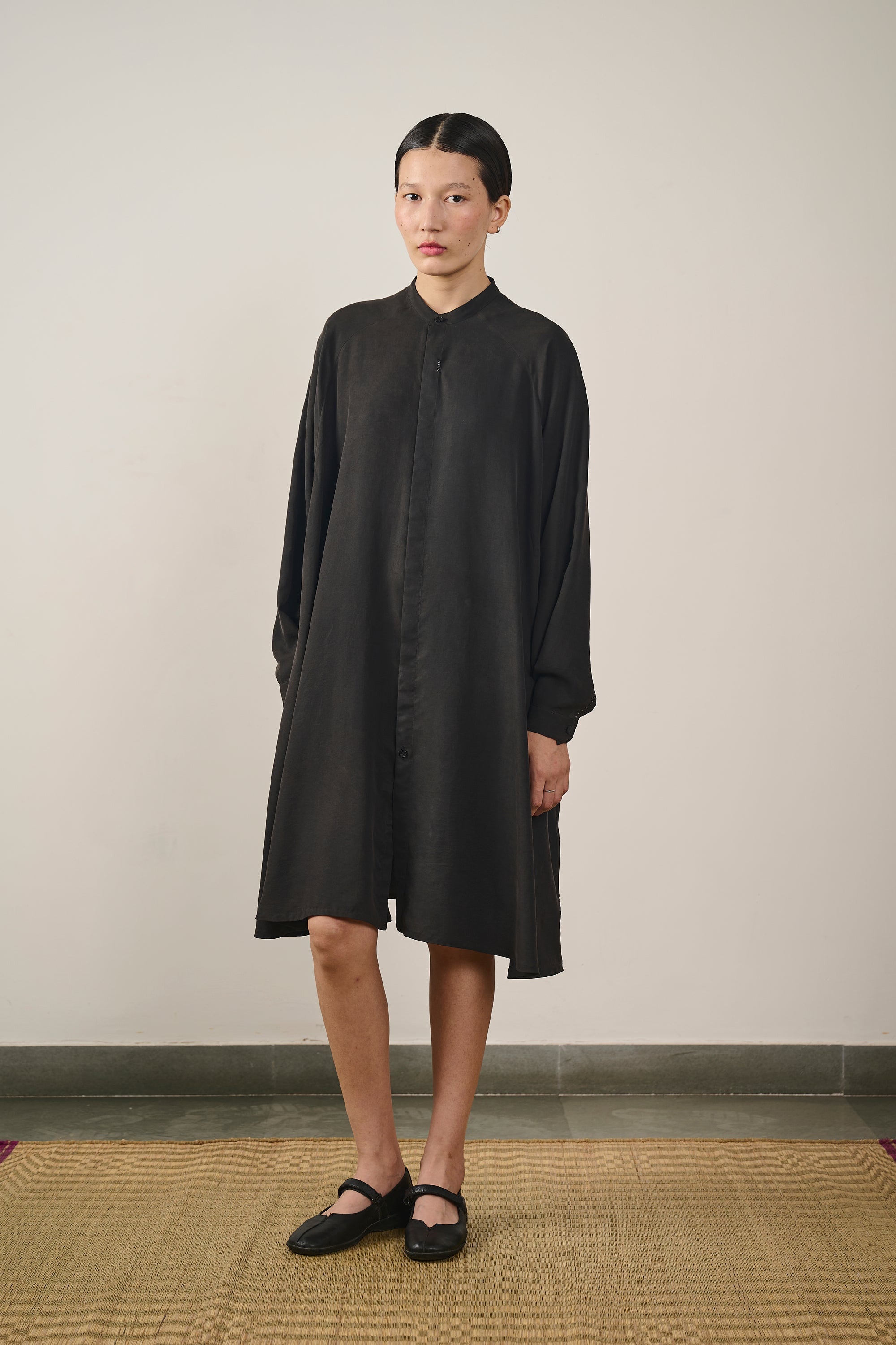 A woman wearing black dress