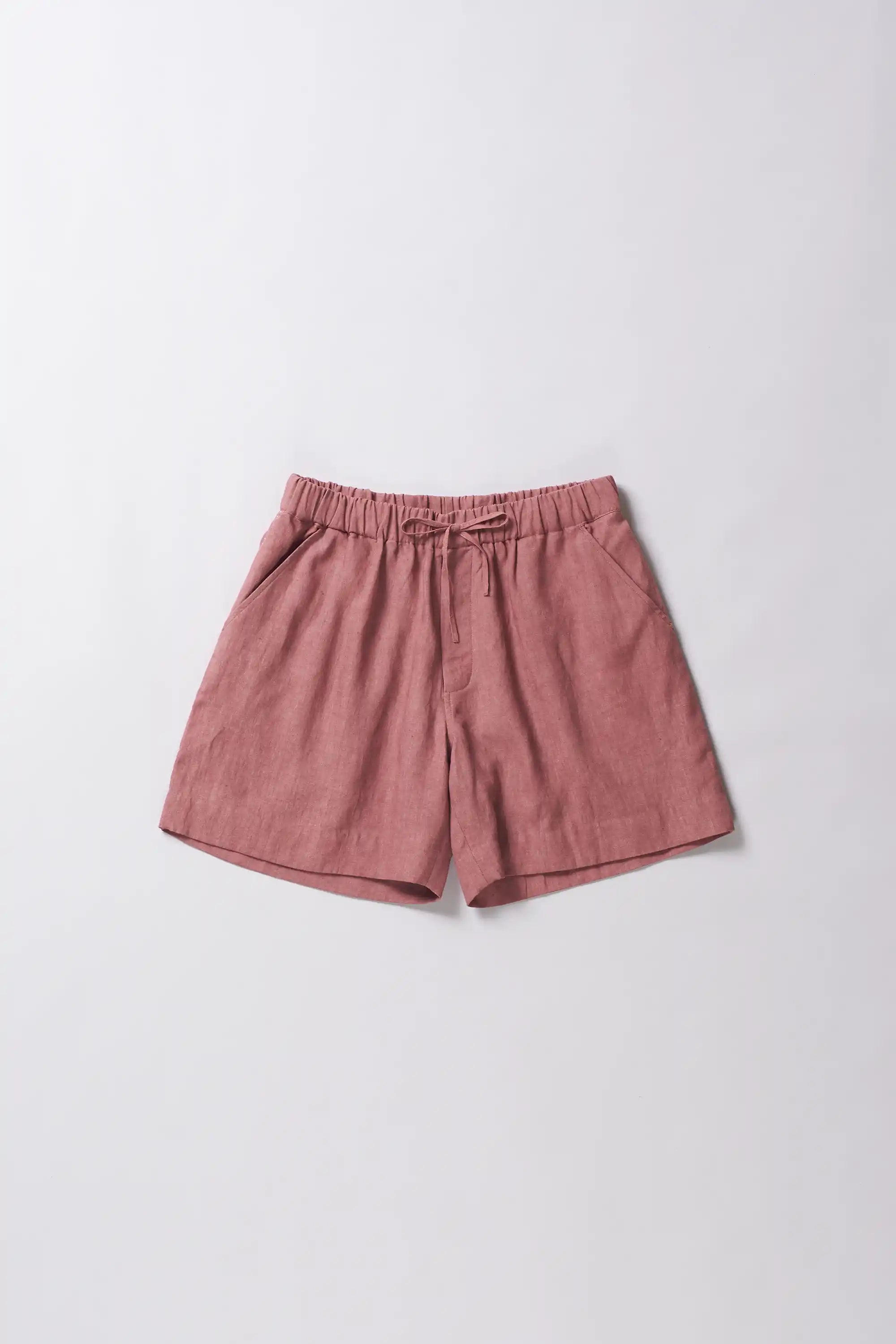 Front image of a linen rouge pink shorts