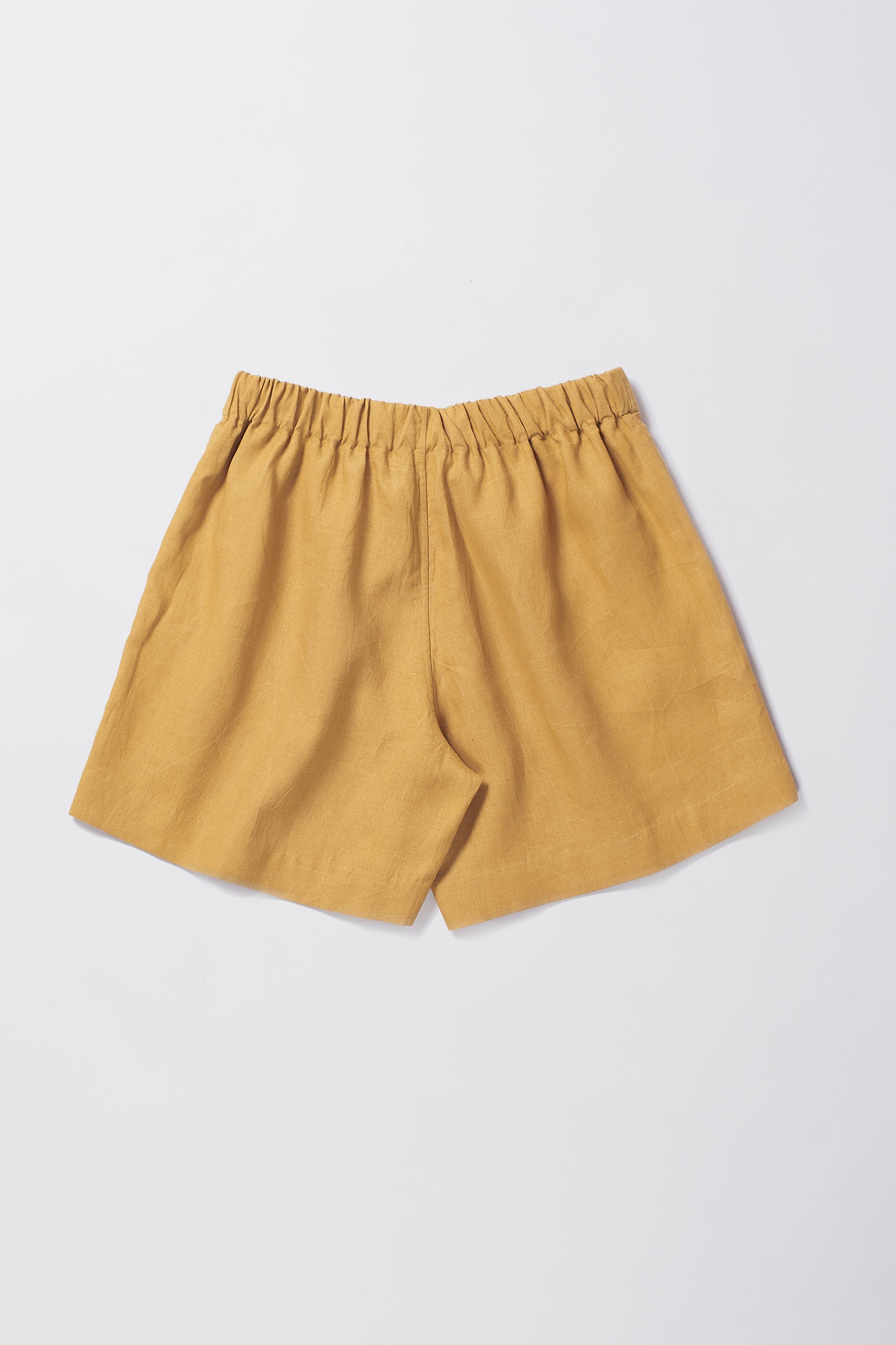 LINEN SHORTS IN MUSTARD YELLOW