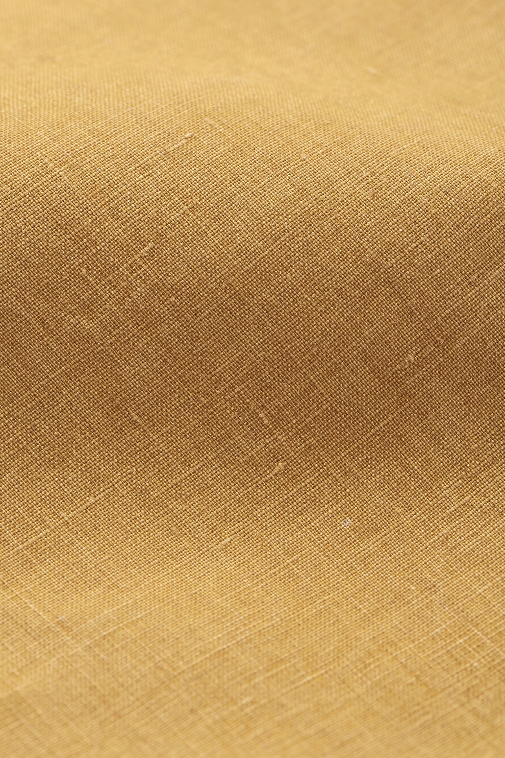 LINEN SHORTS IN MUSTARD YELLOW