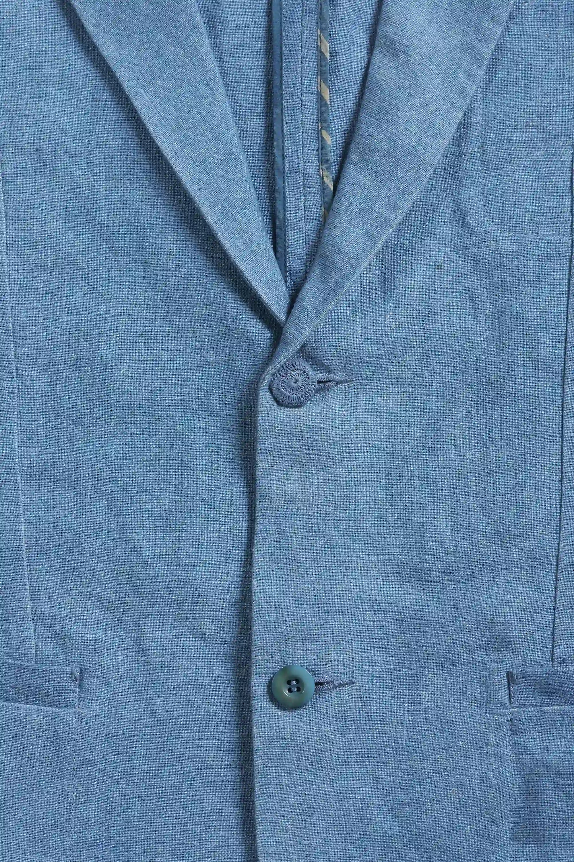 Close-up of a blue fabric with buttons
