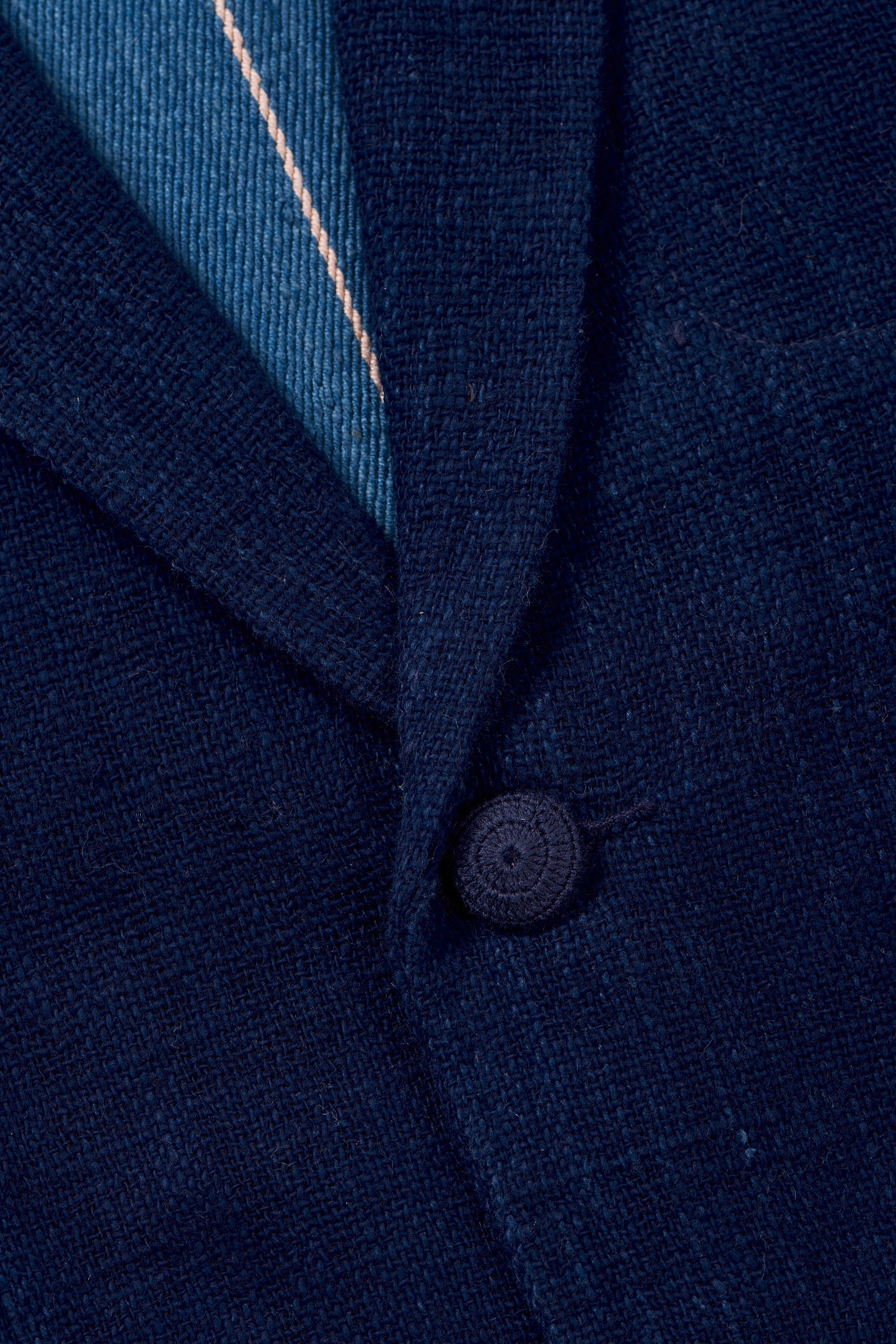 A close-up shot of medium indigo jacket
