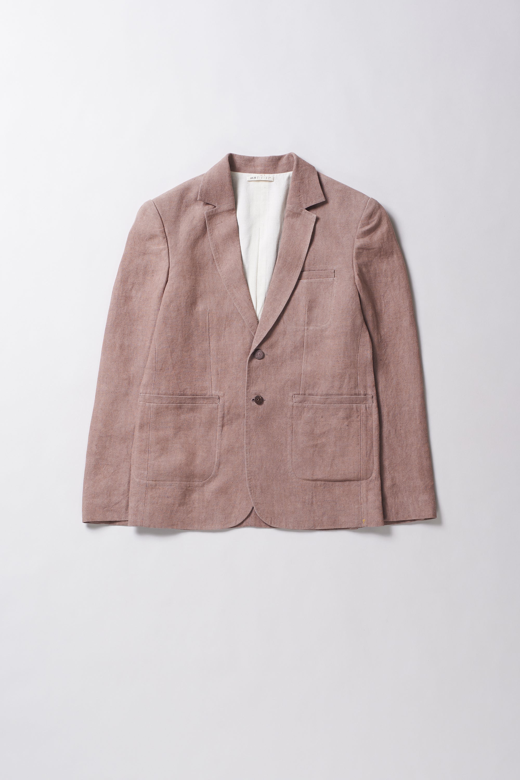 Old rose blazer on a light grey background