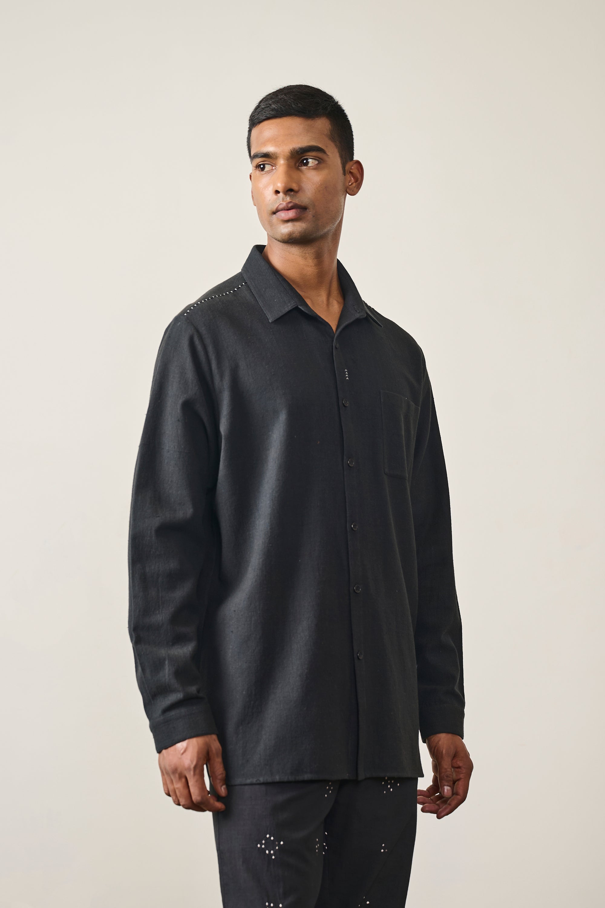 A man wearing black shirt