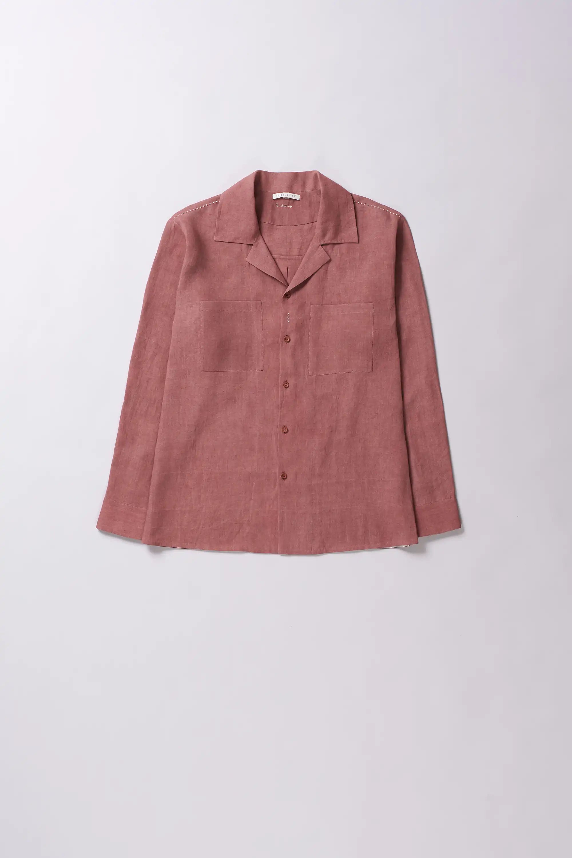 Front image of a linen rouge pink shirt