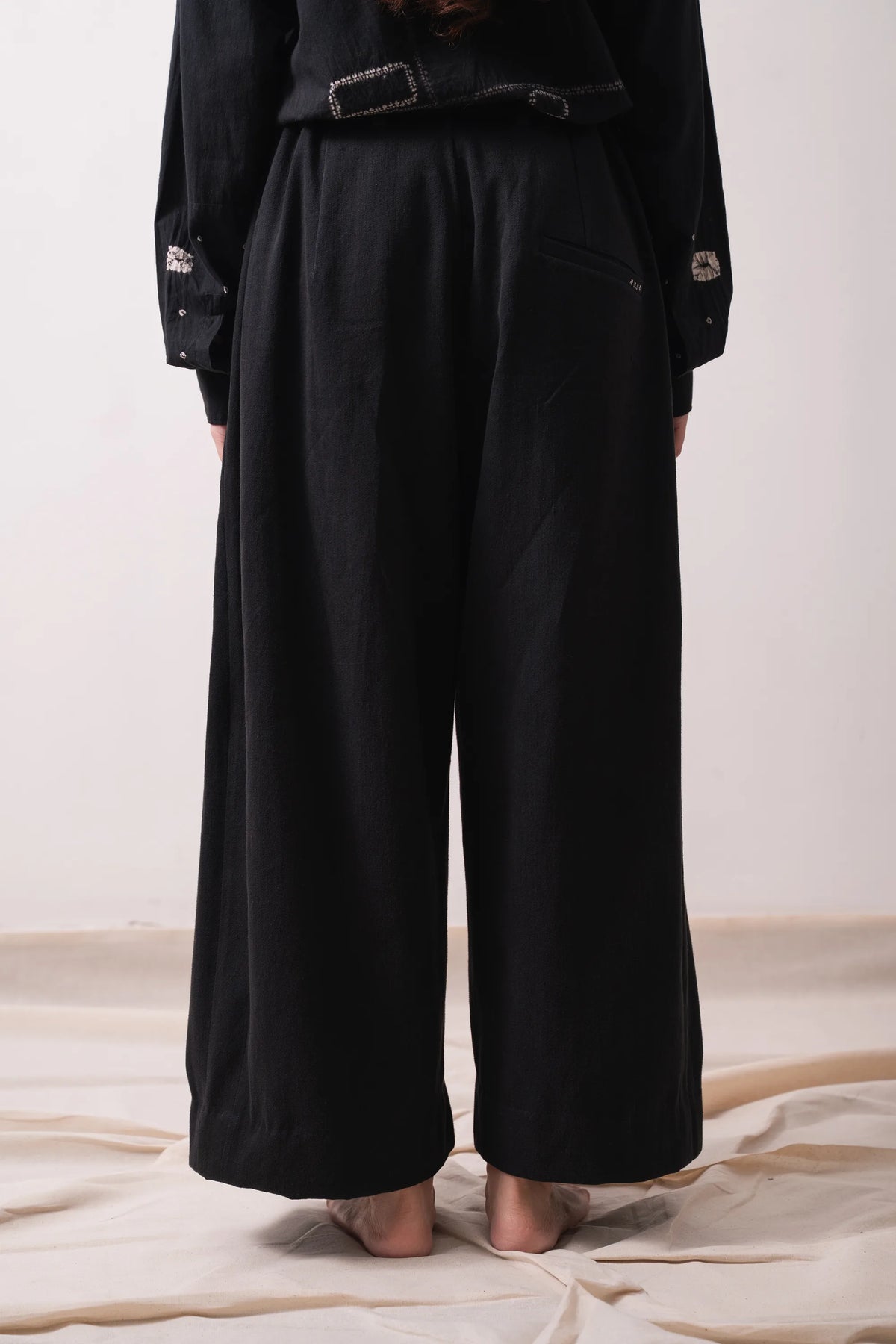 Black Relaxed Pleated Trousers