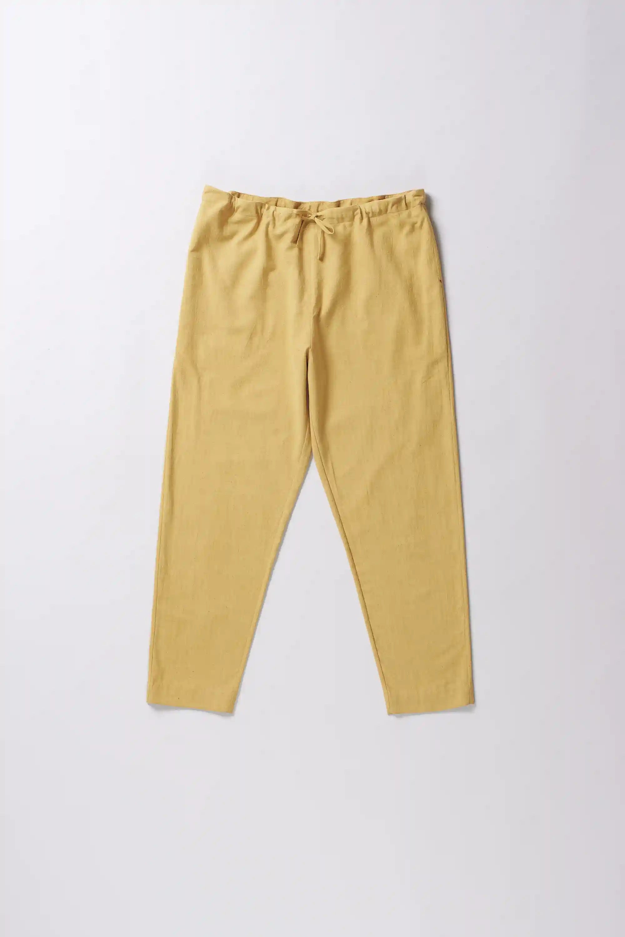 Front image of a ochre yellow cotton pant