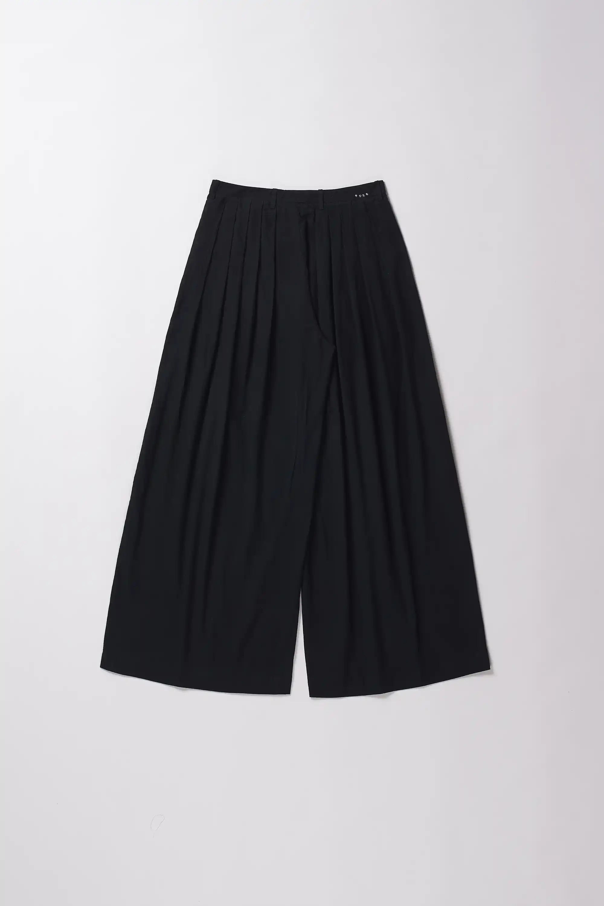 Black wide-leg pants on a white background