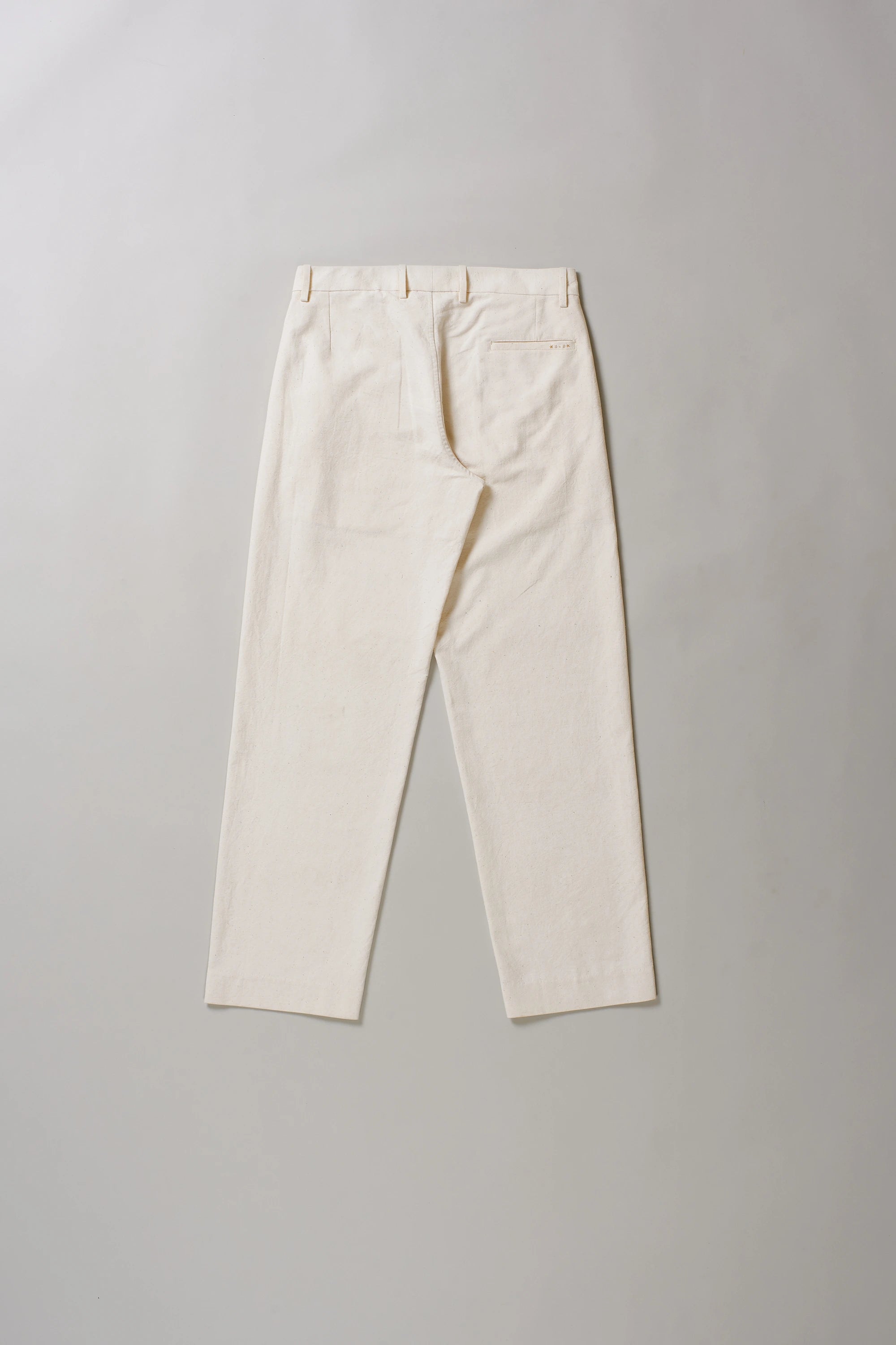 Back image of pants on a grey background