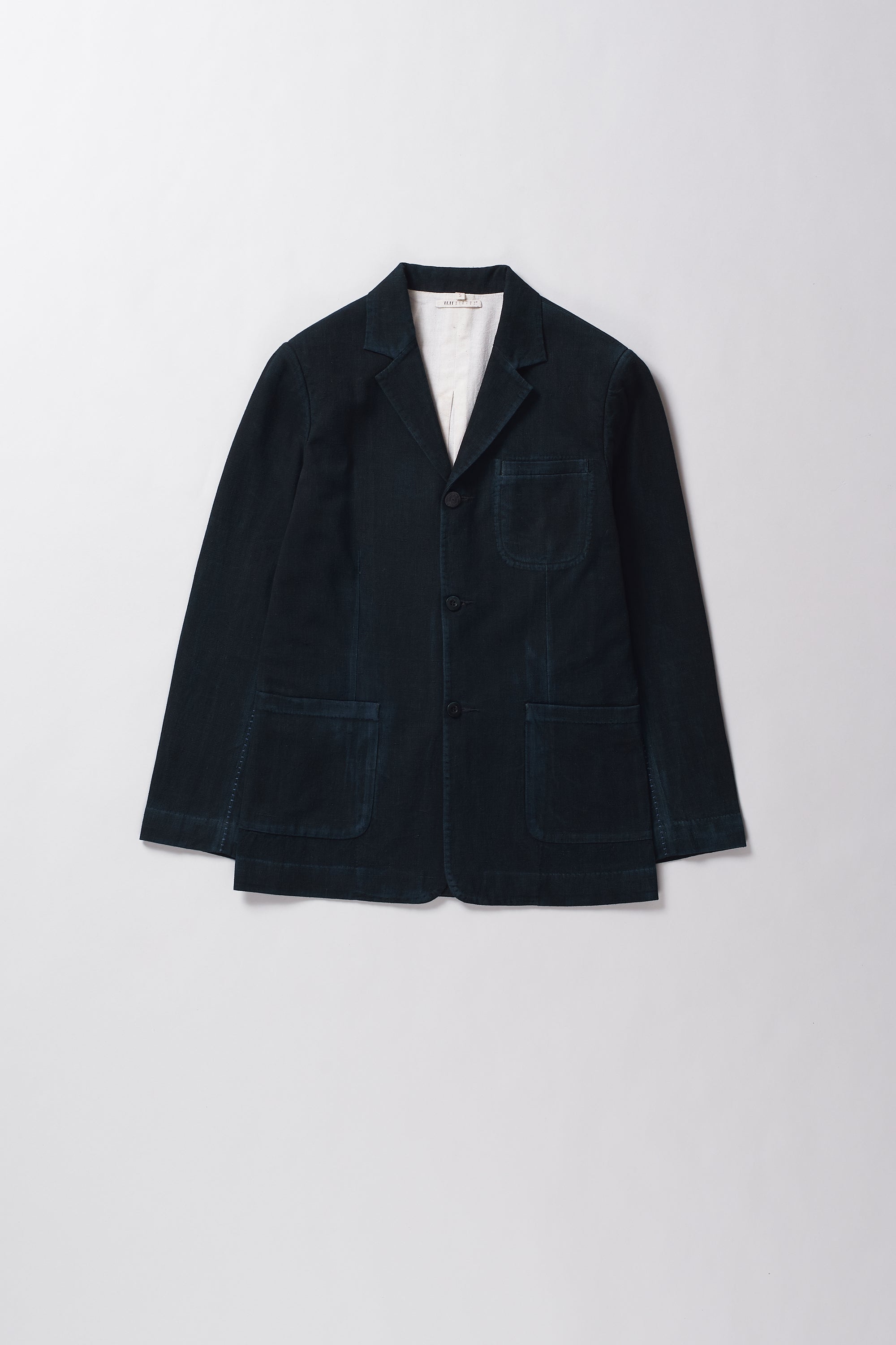 Dark blue blazer on a white background