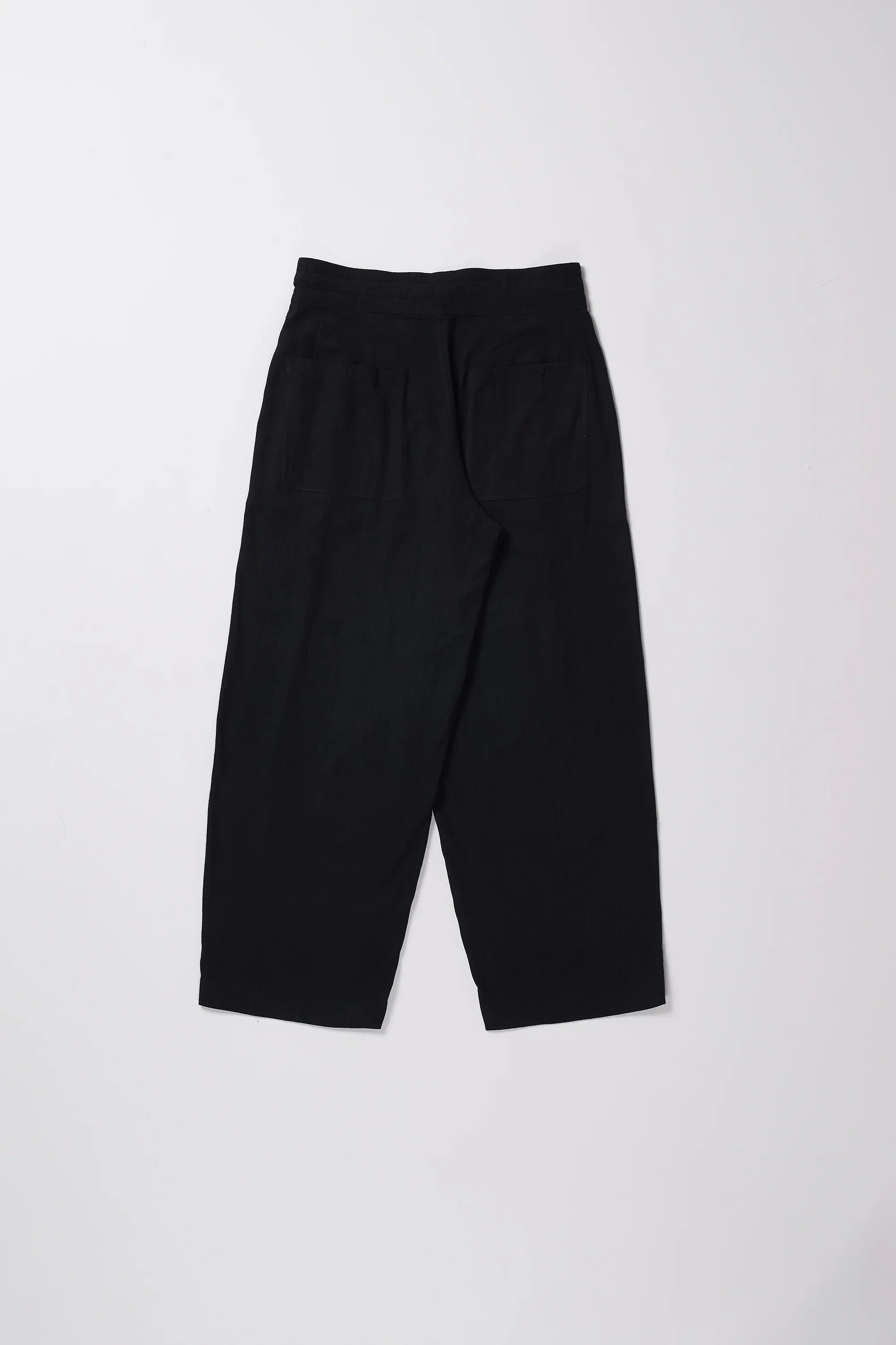 Back image of a cotton trouser in black