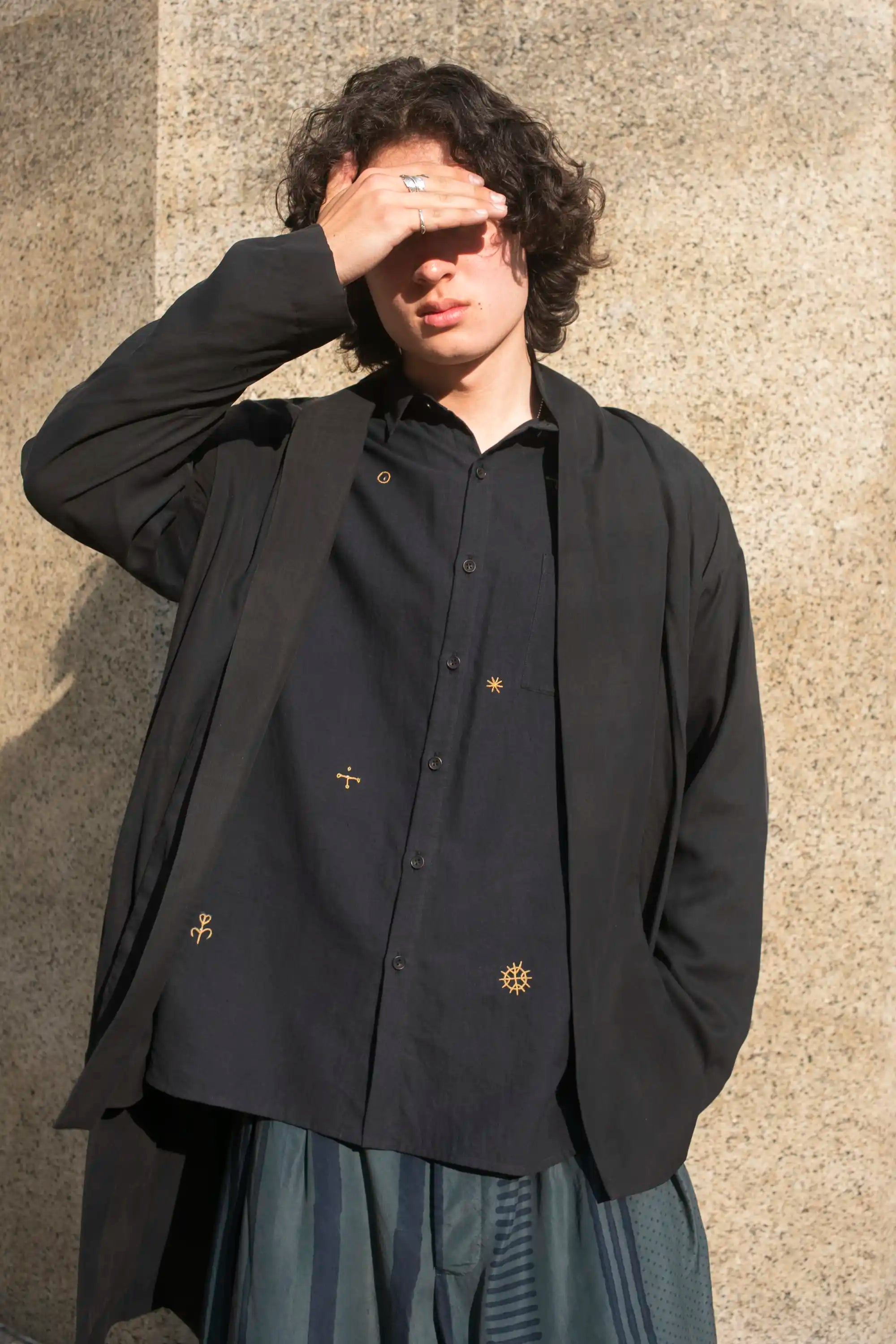 A man wearing black jacket