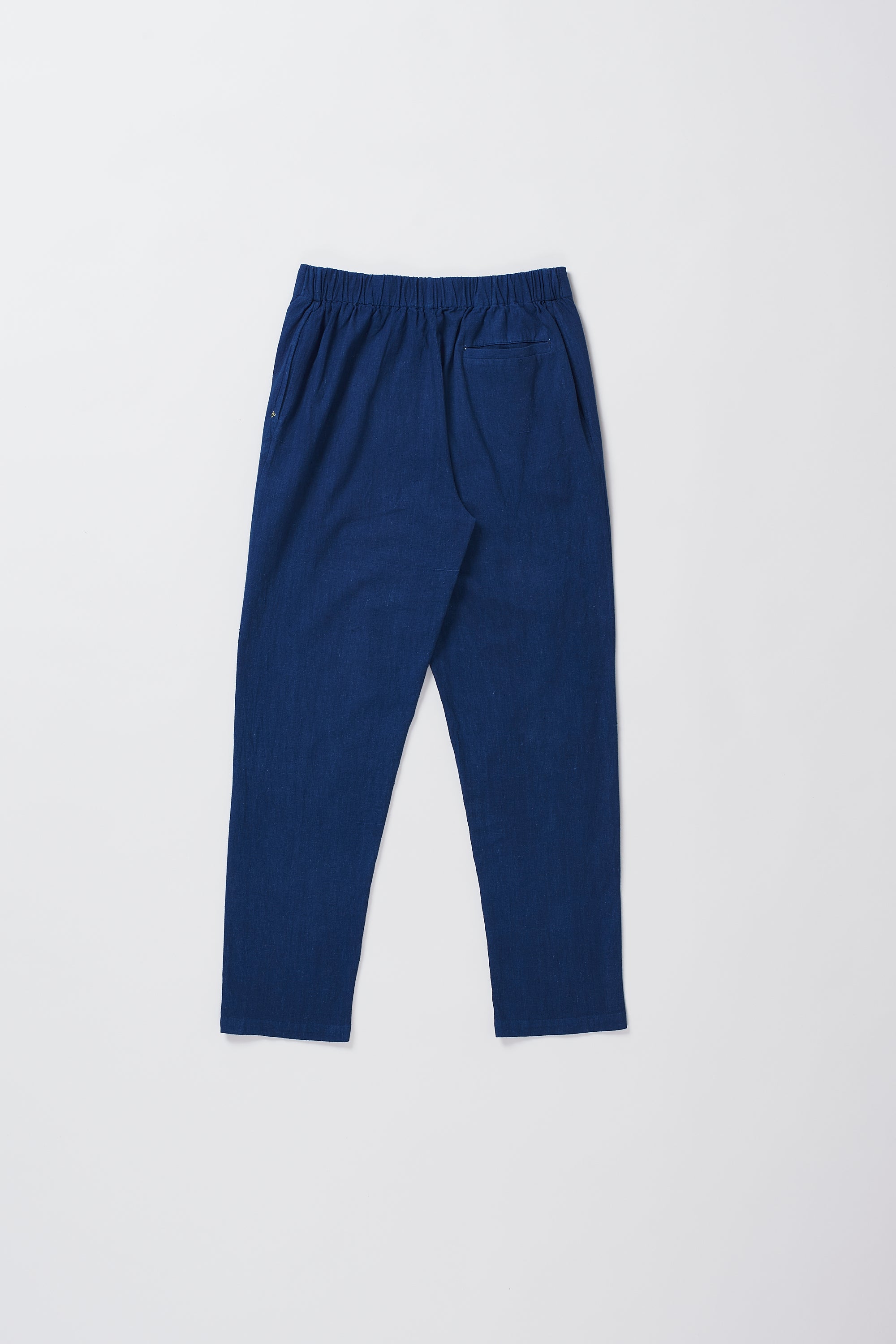 TAPERED FIT TROUSERS IN MEDIUM INDIGO