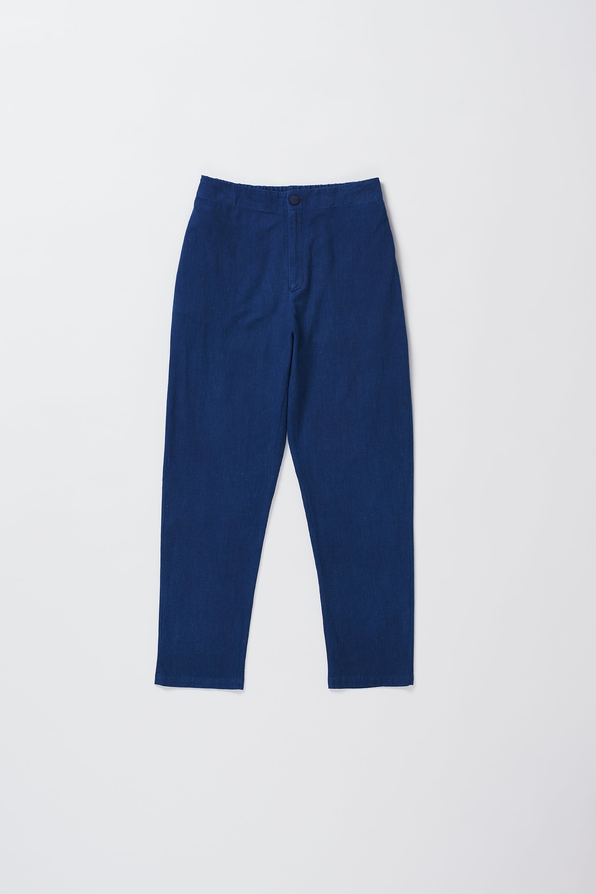 TAPERED FIT TROUSERS IN MEDIUM INDIGO