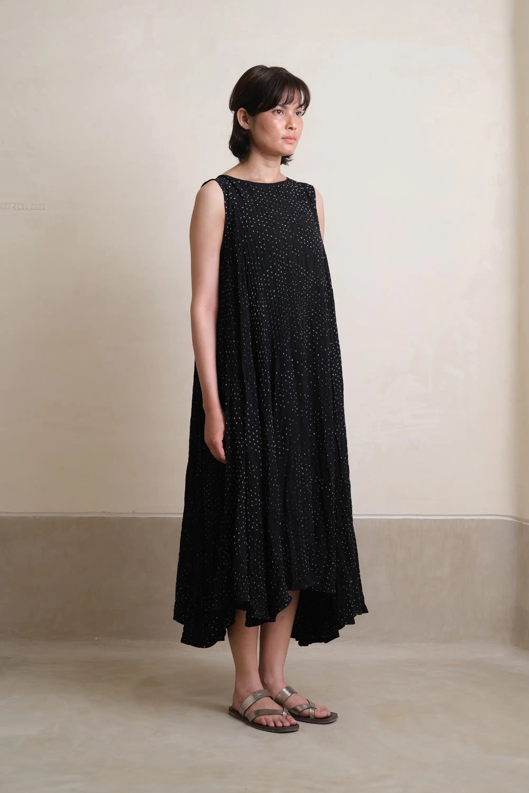 A woman wearing black dress