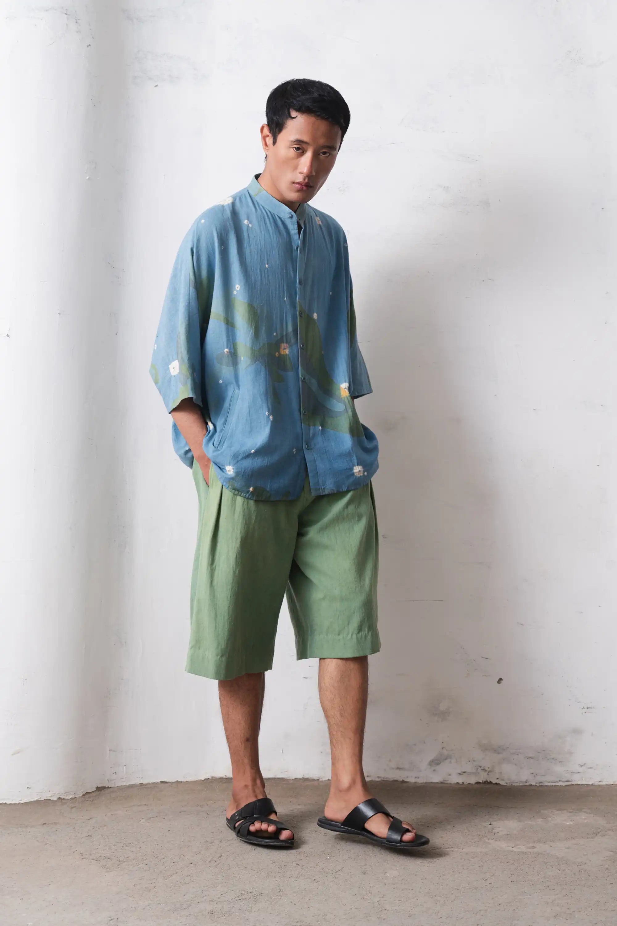 A man wearing sky indigo cotton shirt