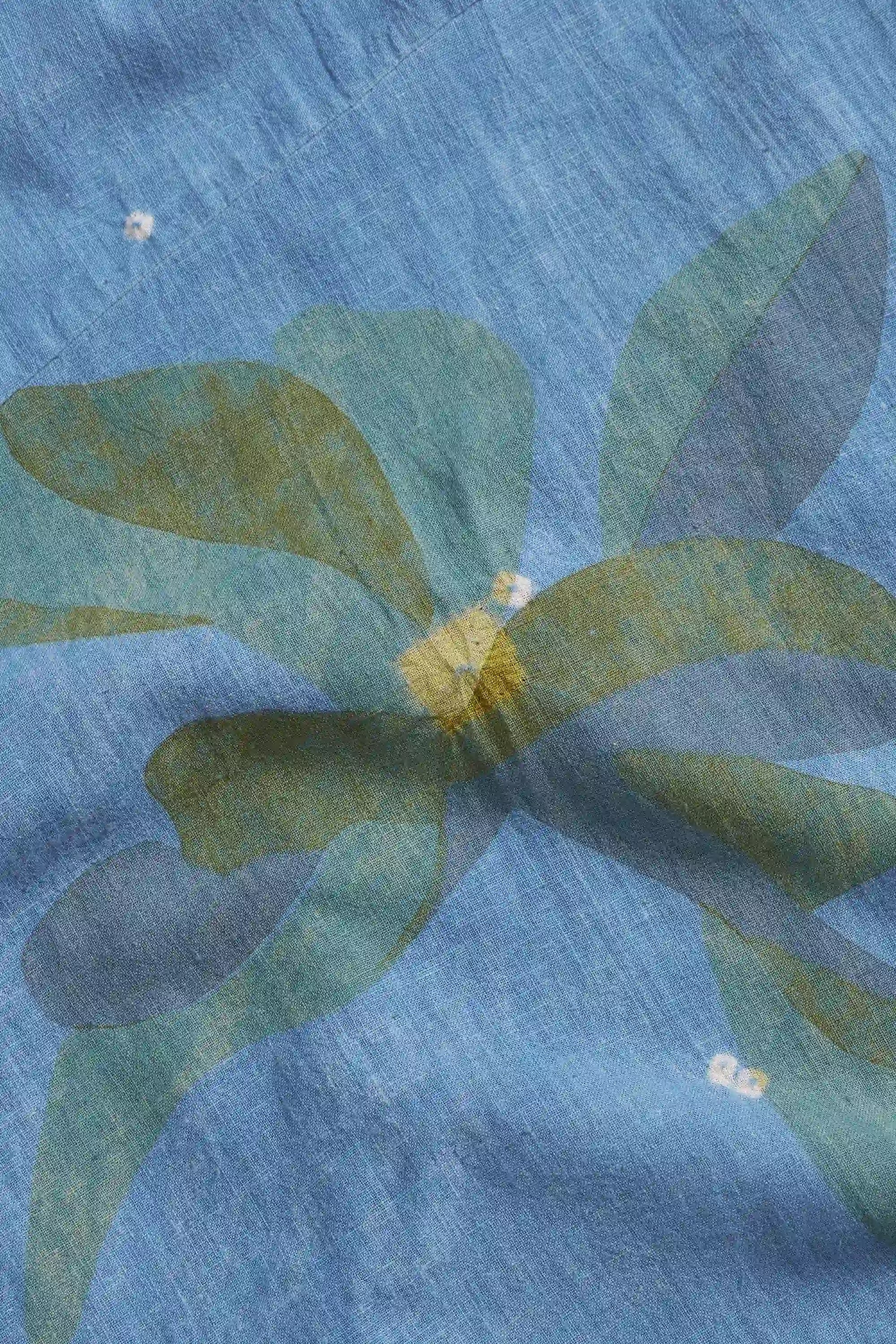 Close-up of a blue fabric with hand paint