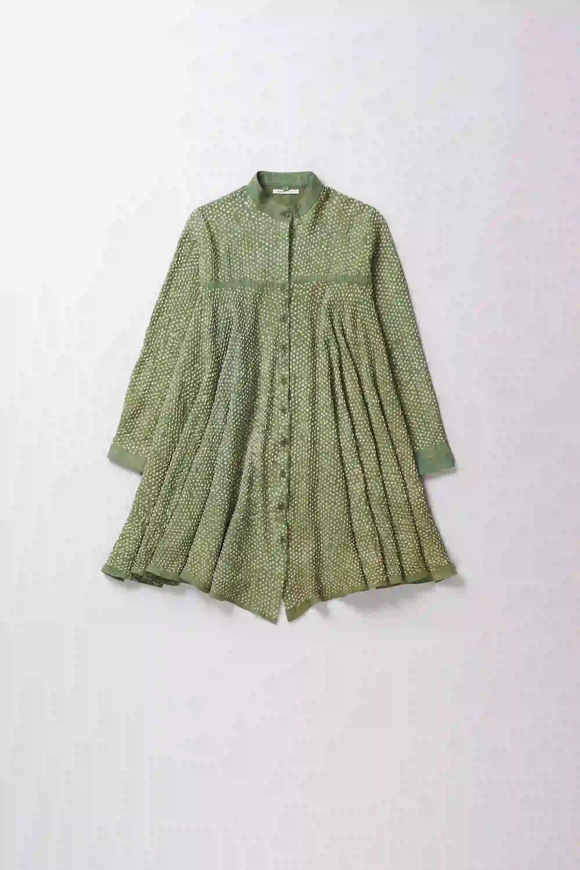 Front image of a turf green cotton dress