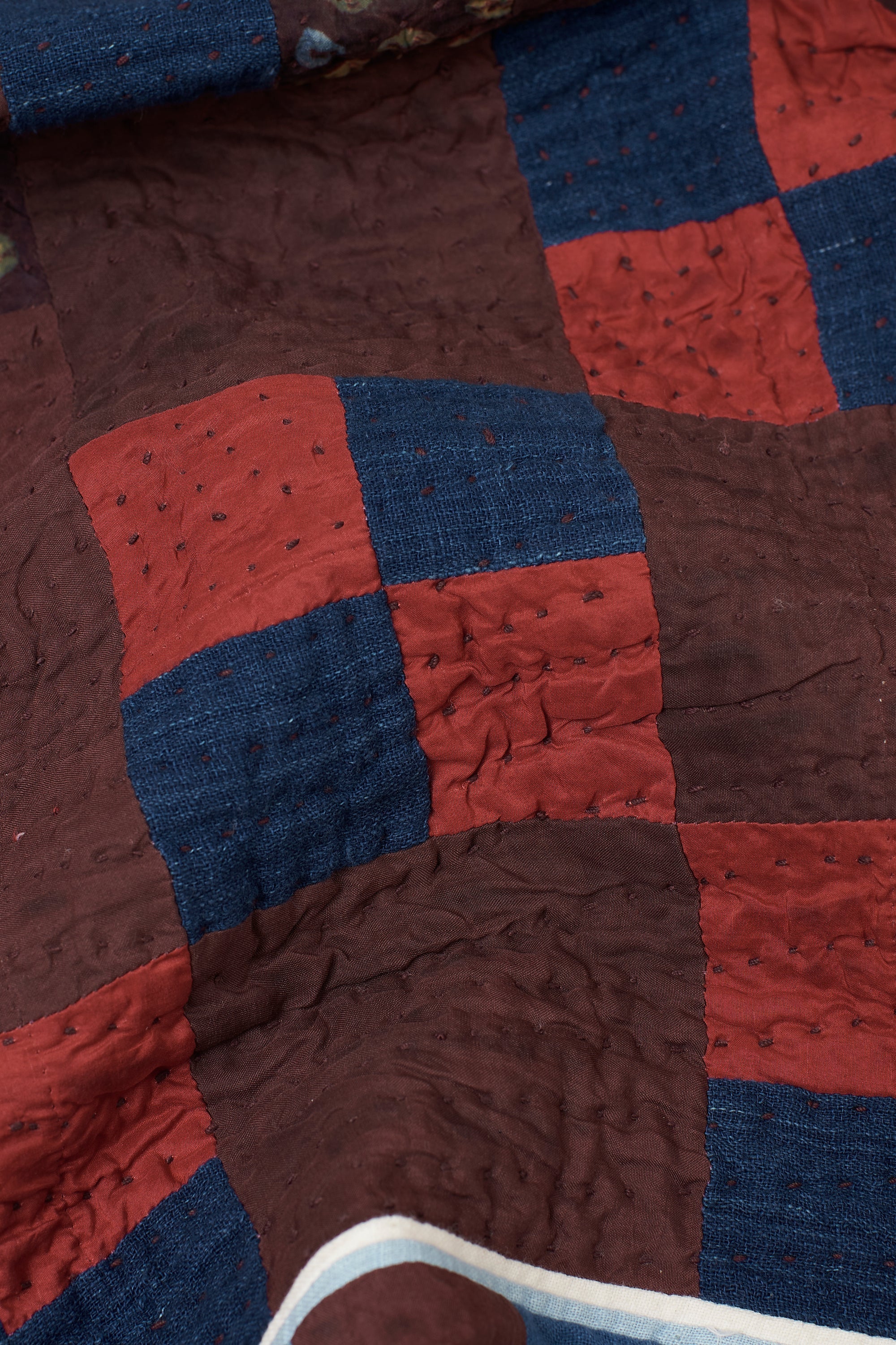 Hand Embroidered Patchwork Quilt in Shades of Wine