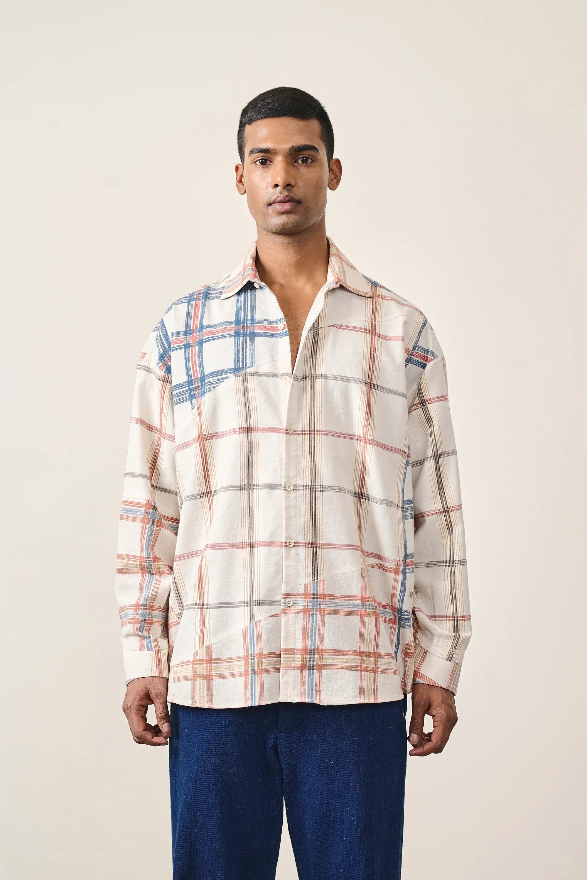 A man wearing multi colour cotton shirt
