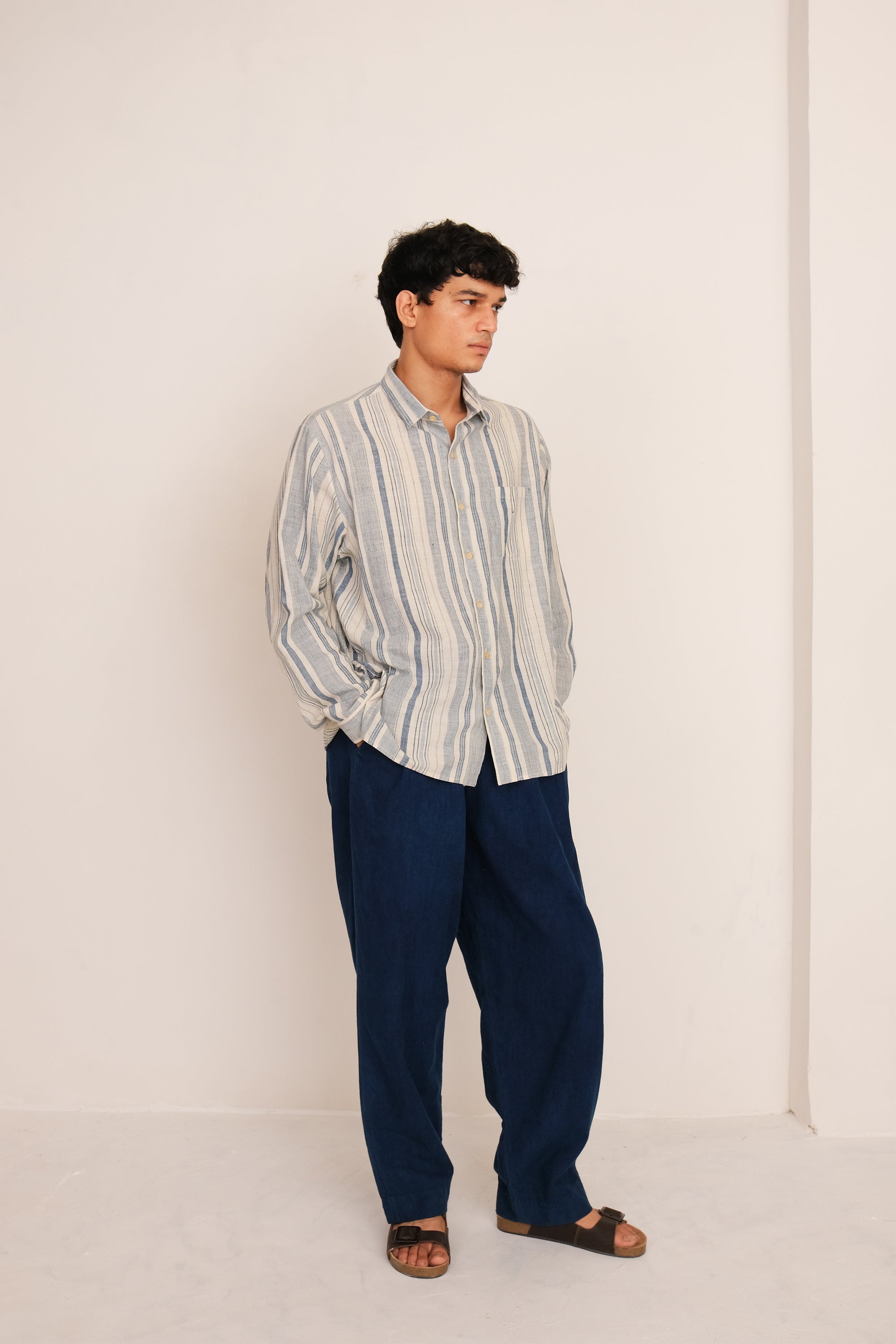 Closeup shot a man wearing indigo cotton pant
