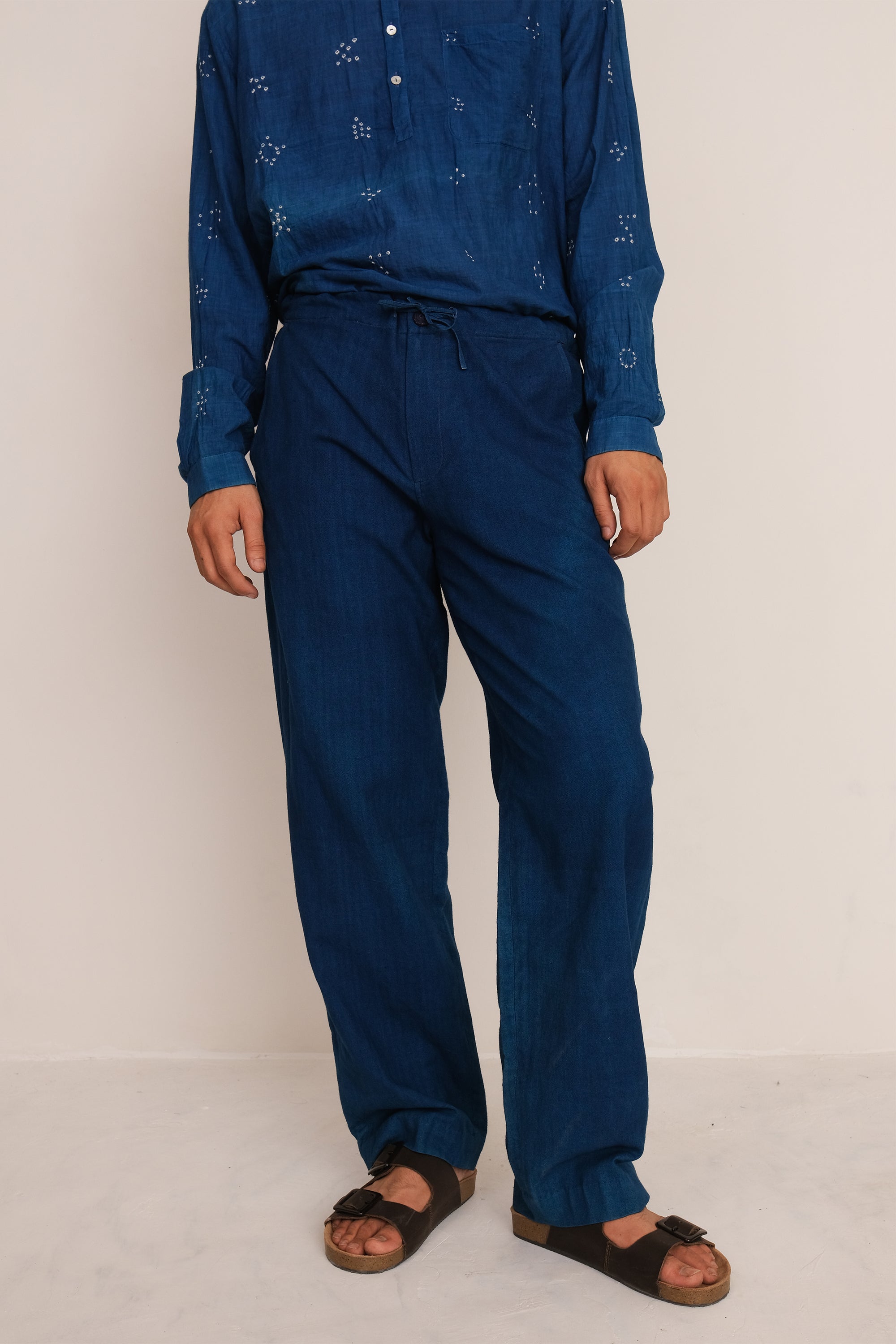 A man wearing of medium indigo cotton pant
